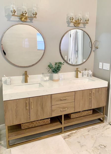 Love my new bathroom vanity!  Modern wood and gold bathroom vanity with gold faucet.  Bathroom decor, bathroom furniture 

#LTKstyletip #LTKsalealert #LTKhome