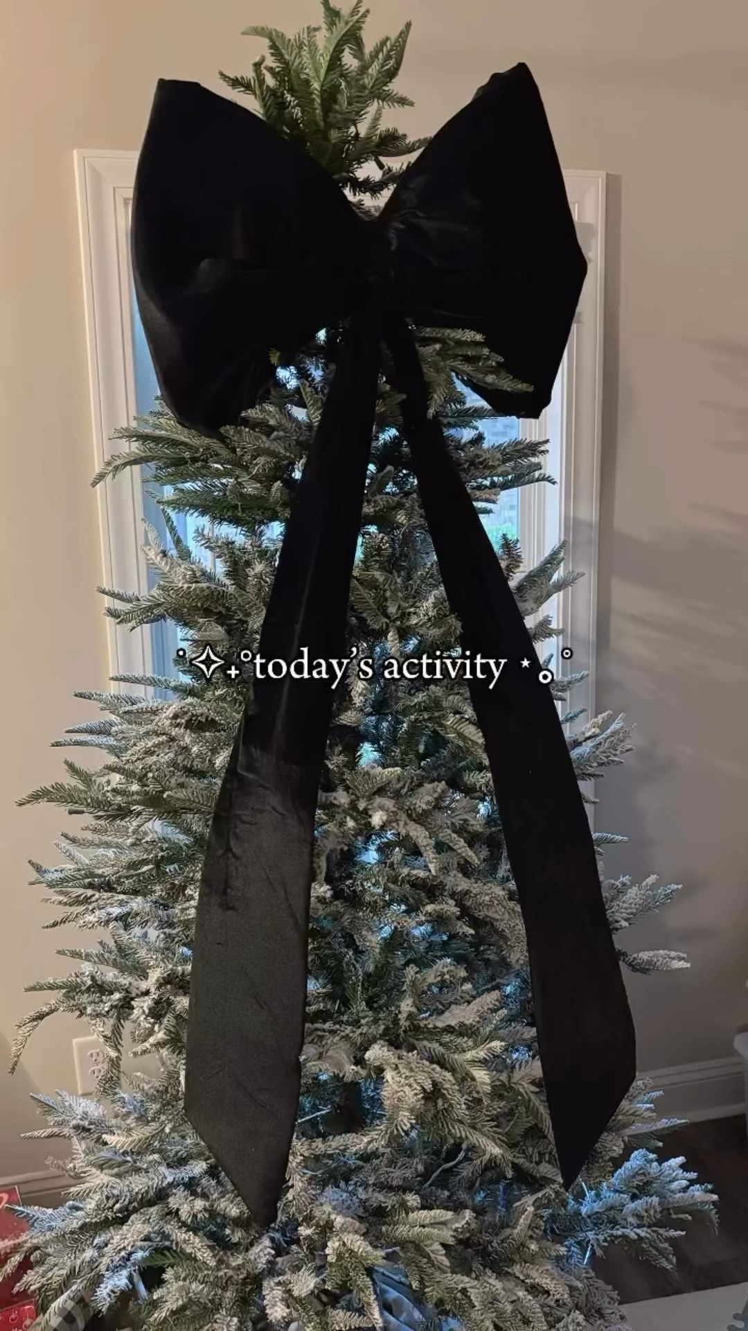 This bow is everything 🎀😊. I wanted to continue my black bow theme from my 40th birthday this year and what better way to wrap this year up! ✨ The girls were worried when I said we weren’t having a star on the tree but they LOVE it! 😍 This bow to me about 30 minutes to make and I think I’ll make 4 smaller ones for the stairs! Super easy!! What do you guys think? #giantbow #Christmasbow #giantbowtutorial #diychristmasbow #blackbow #blackbowdecor