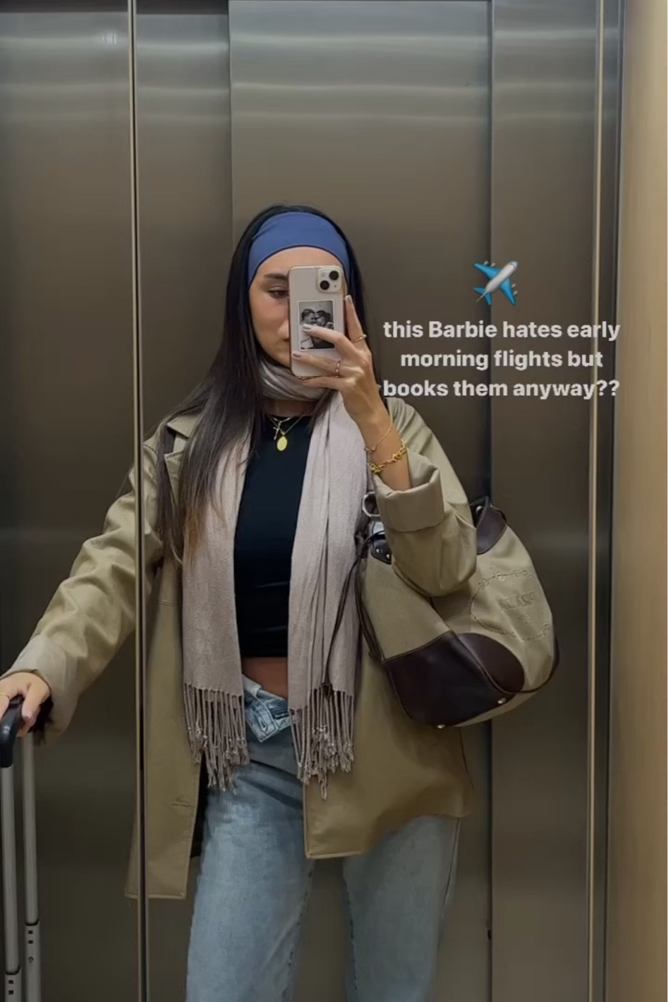 ✈️ short haul flight fit - sand faux leather jacket, navy blue headband, brown scarf, light wash straight leg blue jeans, gold pendant necklace, hand luggage white suitcase 

#LTKstyletip #LTKtravel