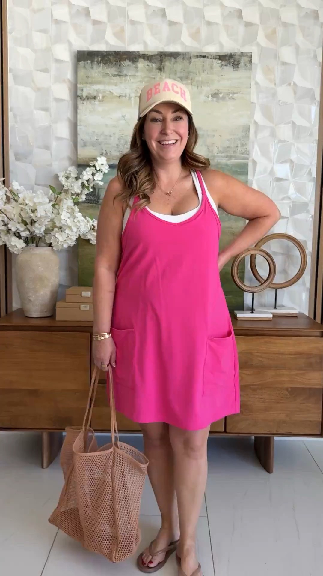 This one piece casual romper in magenta is double layered with built in shorts and a loose fit.  I'm wearing it layered with a sports bra, perfect for a casual beach day outfit or pool coverup! 

📏Sizing Tips: Wearing true to size, L

#LTKMidsize #LTKSwim #LTKTravel