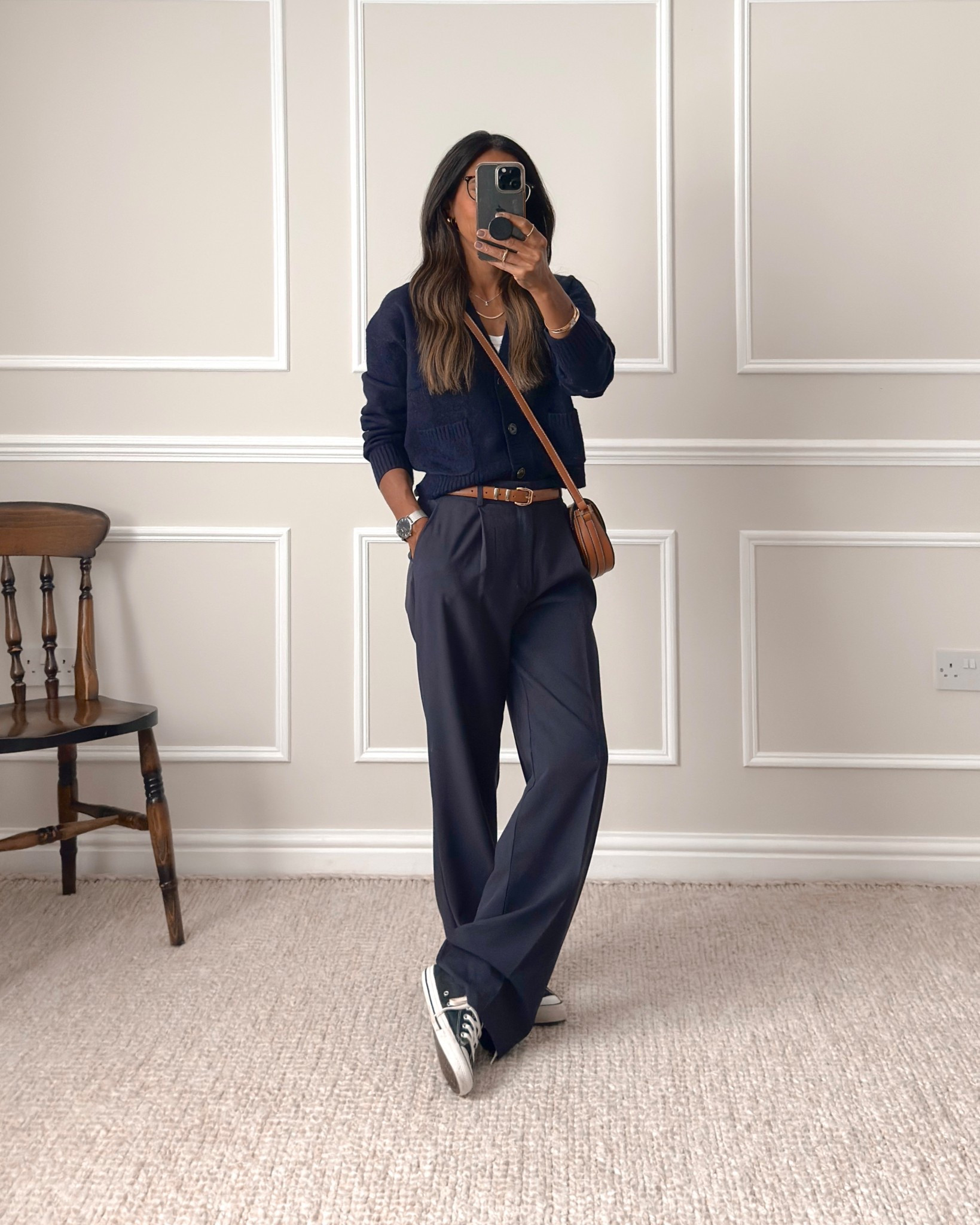 Navy cardigan - wearing size XS. You have 2 options to purchase. The first is from Uniqlo and is the one I’m wearing here. This is a boxy fit so would definitely recommend sizing down. With pockets.

The second option is another cardigan that’s really similar from H&M which I also own - they had this last Autumn too. I’d recommend XS if you’re a similar build to me. Quite oversized and this one doesn’t have pockets.

I’ll link the other available colours for you.



Navy wide leg high waist trousers - wearing my normal trouser size - UK size 8. I’m 5’5 and they are long on me but I use wonderweb or safety pins to turn them up along the back hem so bear this in mind if you’re about my height. 


#LTKeurope #LTKautumn