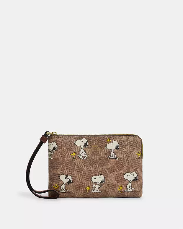 Coach X Peanuts Corner Zip Wristlet In Signature Canvas With Snoopy Print | Coach Outlet US
