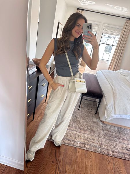 Casual spring 'fit. This ruched top is so good! It comes several colors & is a great basic for spring/summer. I'm wearing a size S in the top & pants. Sneakers fit TTS! 