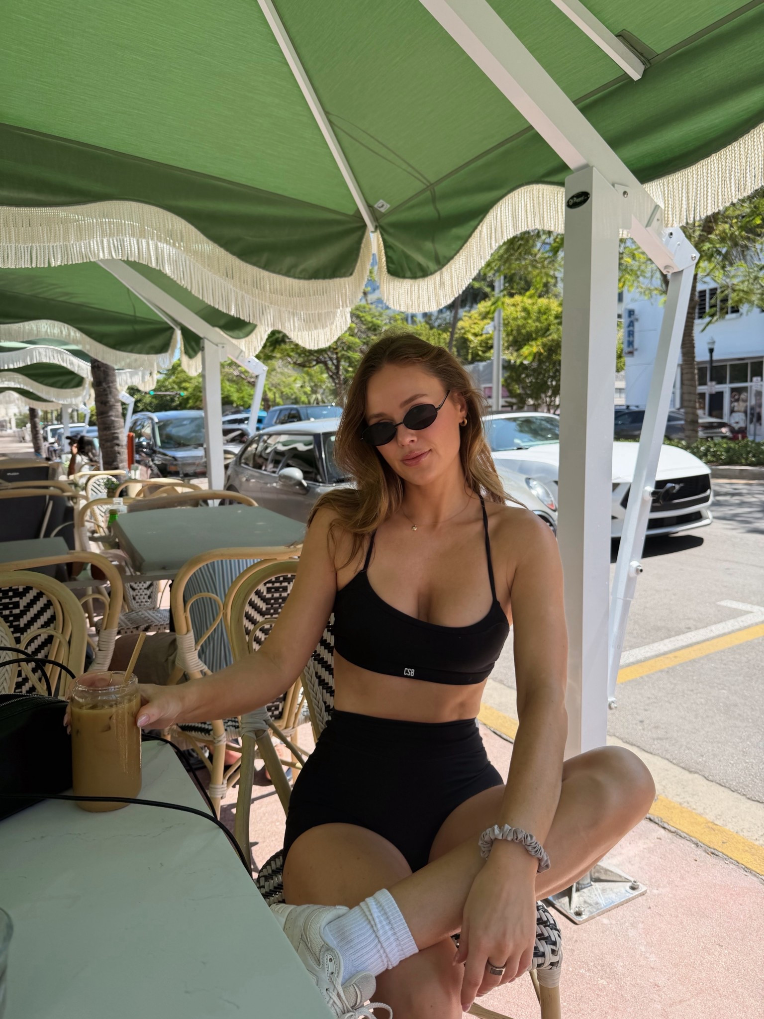 Wearing a m in both the shorts and top 