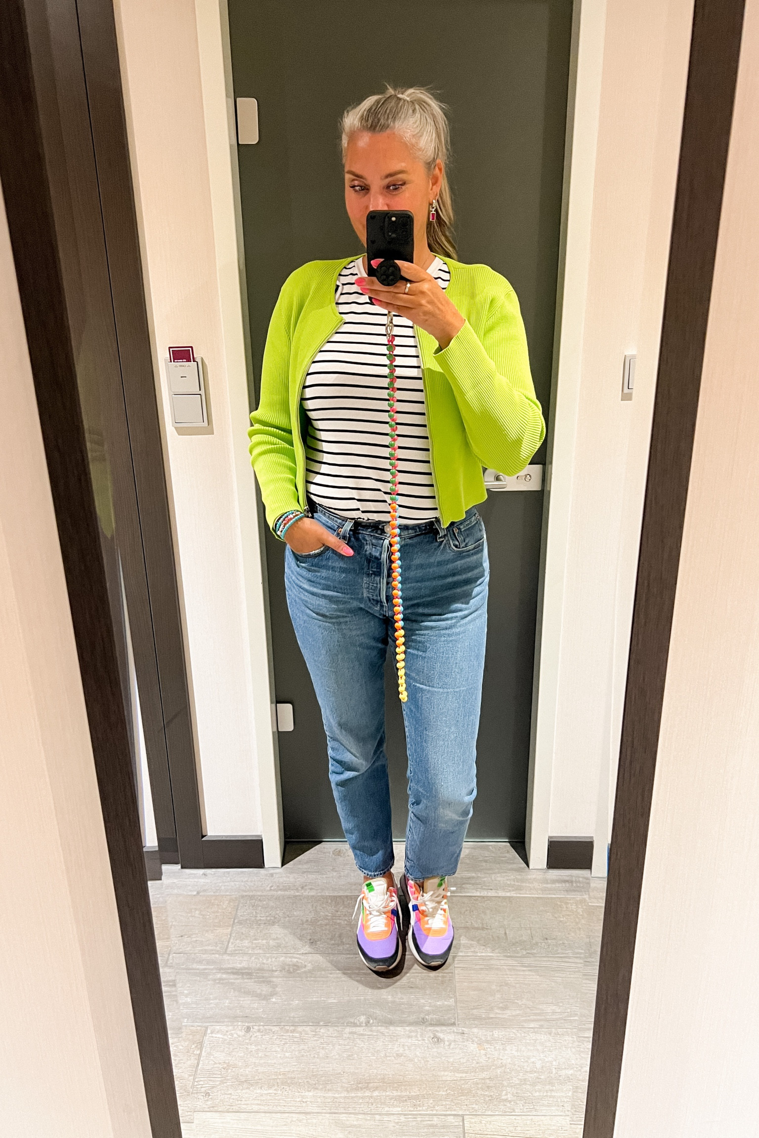 Ootd - Friday. Neon or lime green cropped zip up cardigan over a striped t-shirt with ruffle sleeves paired with Levi’s 501 blue jeans and Puma future ride on sneakers. 



#LTKnederlands #LTKeurope #LTKmidsize