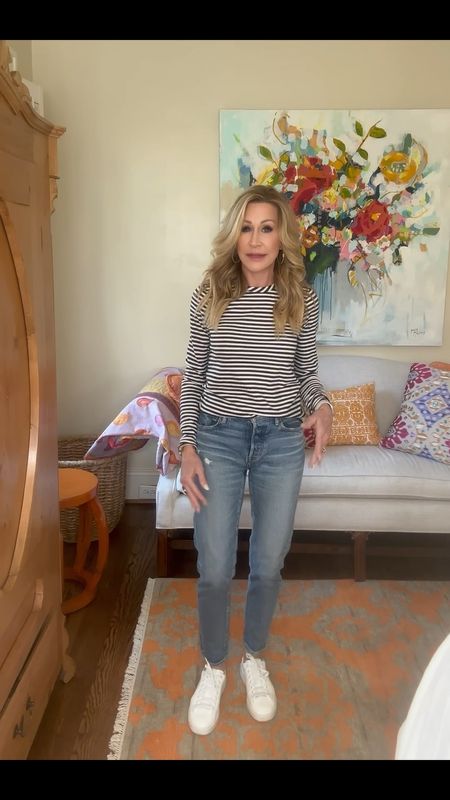 The absolute best tee for everyday!  This striped tee is a Crewneck, long sleeve striped navy and white tee.  It is slightly fitted and a perfect length for tucking in or wearing out.  It’s also ideal for layering.  I’m wearing it with earrings from Lagos, white Golden Goose sneakers, and an Apple Watch.  

#LTKVideo #LTKfindsunder100 #LTKSeasonal