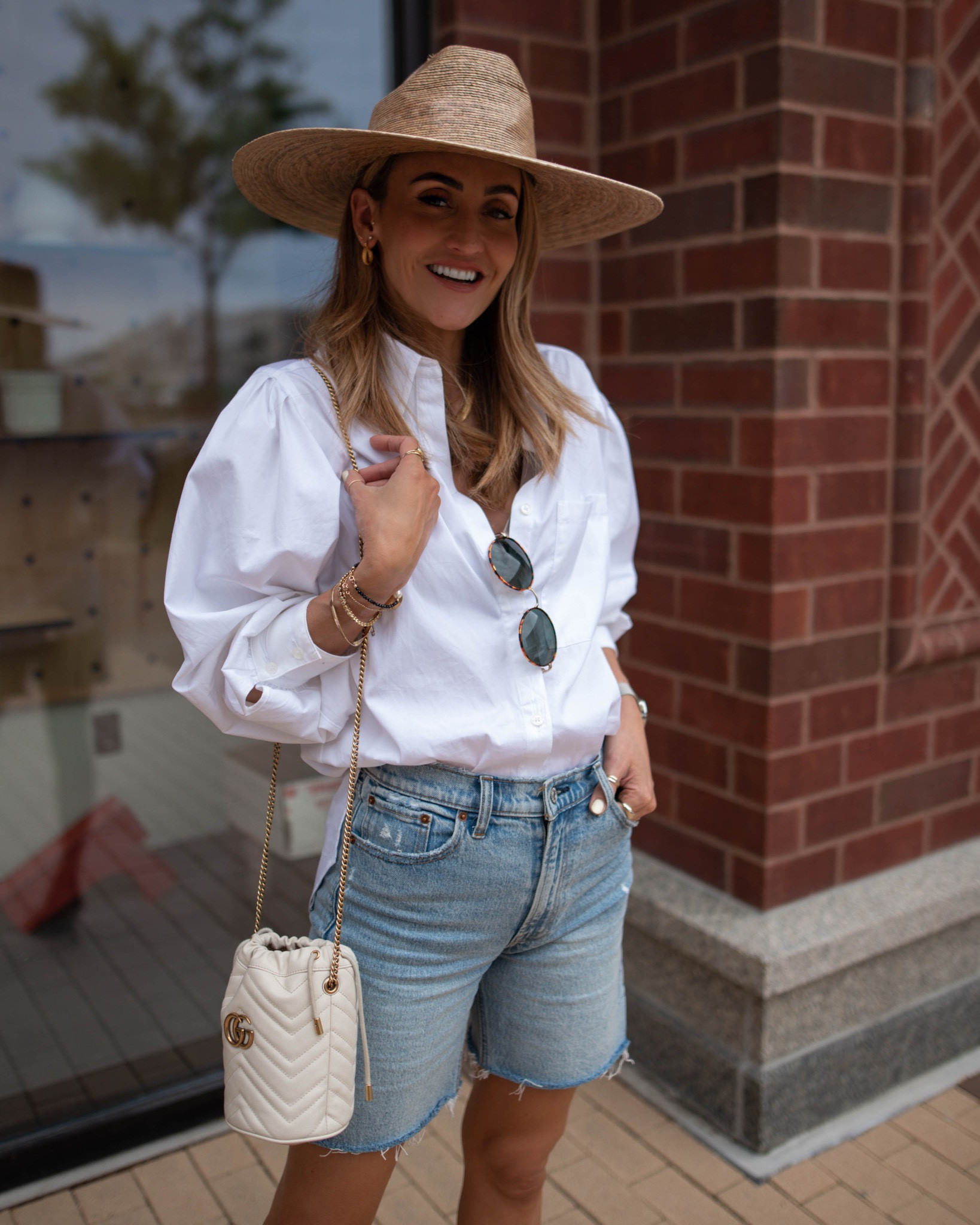 Beach vacation outfit 
Gucci bucket bag
Lack of Color hat
Long denim short
White button down 

#LTKstyletip #LTKtravel #LTKSeasonal