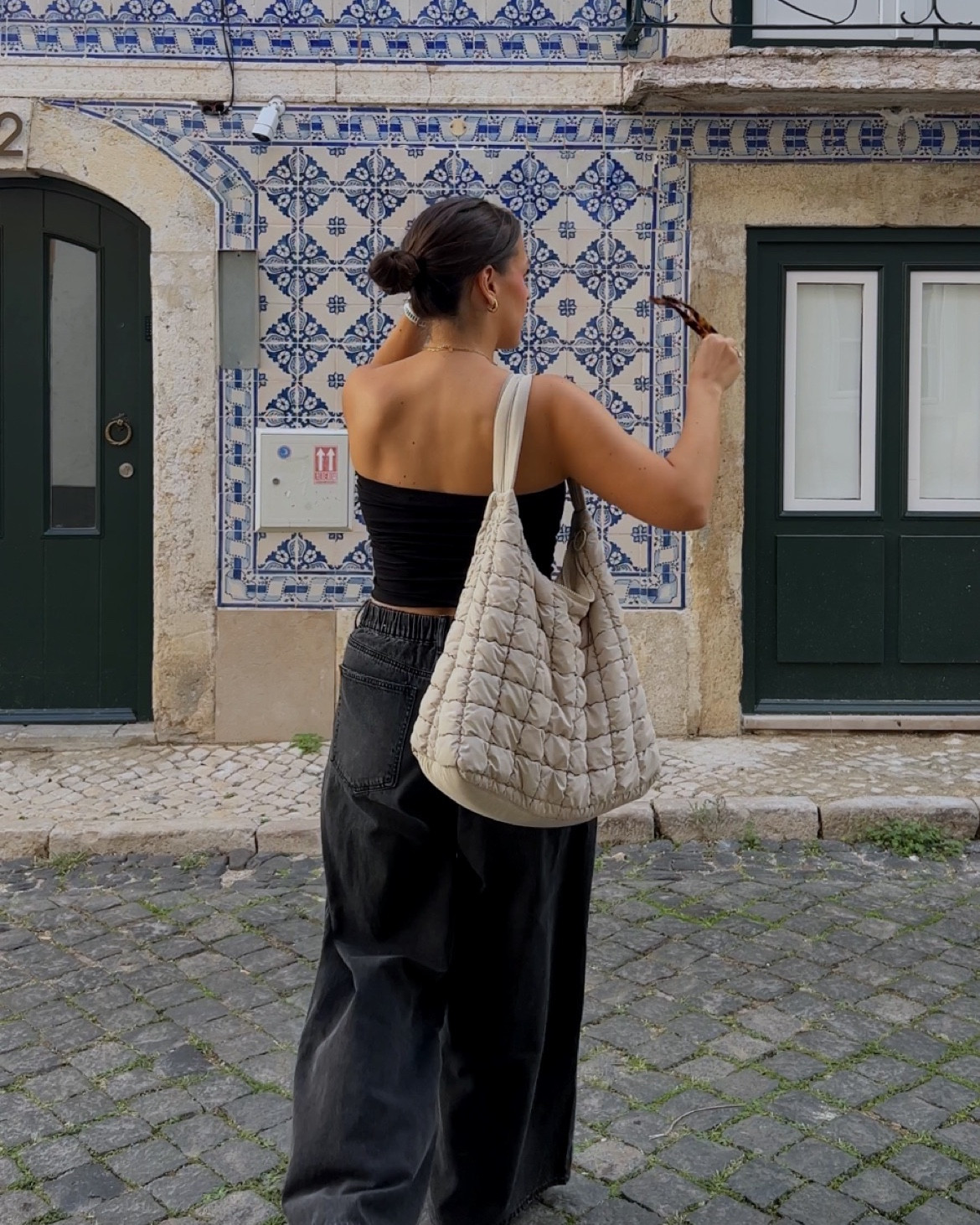city break to lisbon☁️

black baggy jeans, black bandeau, quilted bag 

#LTKeurope #LTKautumn #LTKtravel