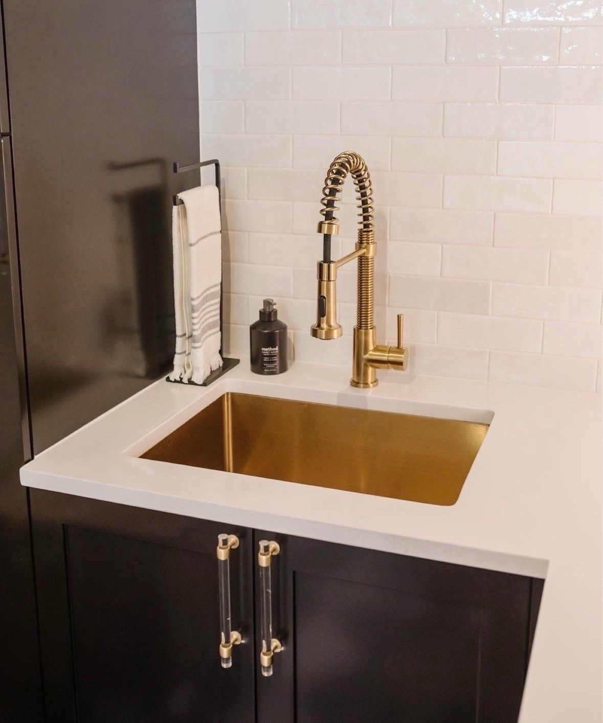 Laundry room functionality with a brass pull down spray faucet and sink. Love the look of the sink    We used this to bathe our toddler when she was first born! The hand towel stand is perfect and slim so it fits anywhere.

#LTKHome