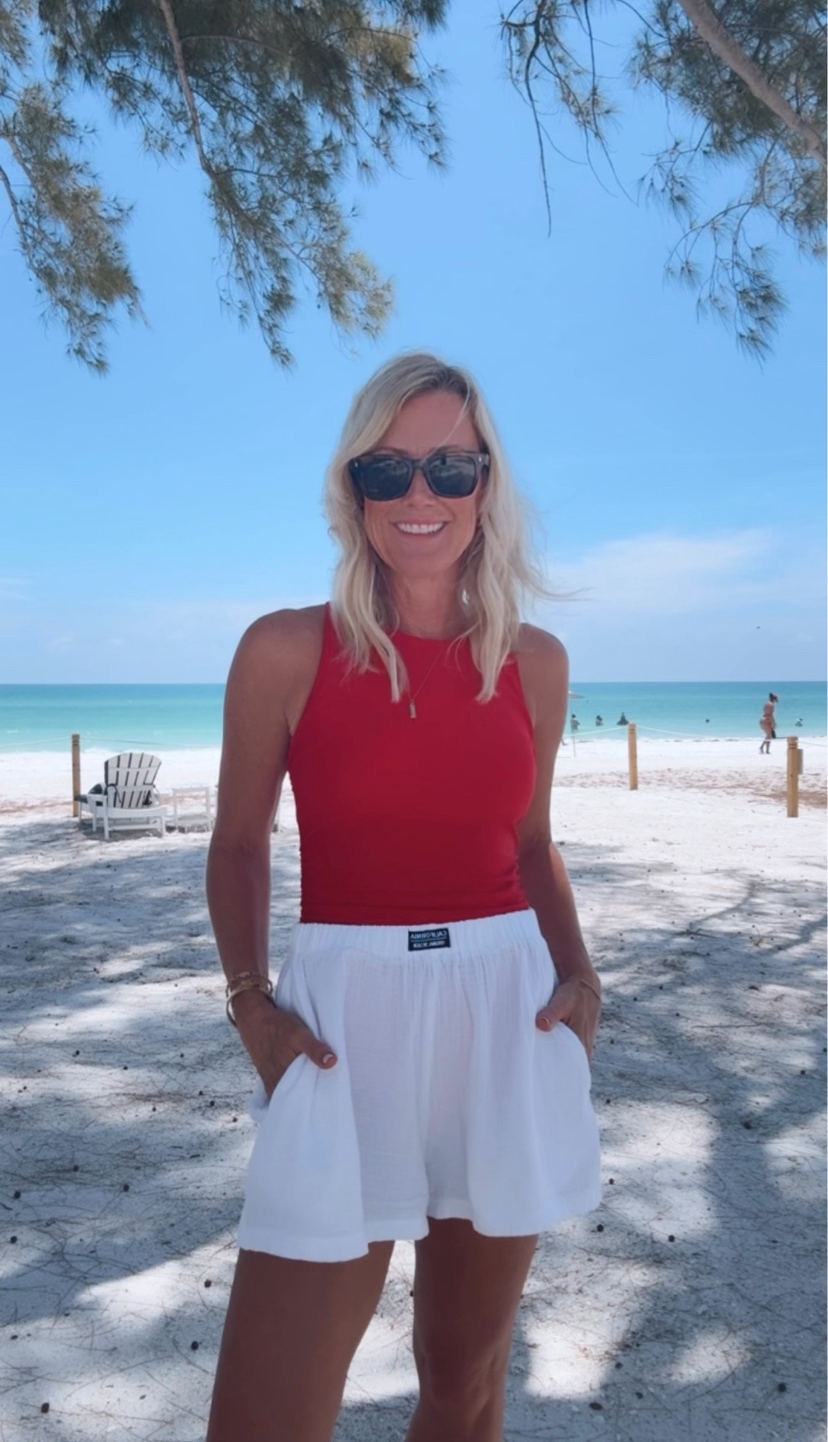 Such a classic and stunning swim look!

Suit: small
Shorts: small