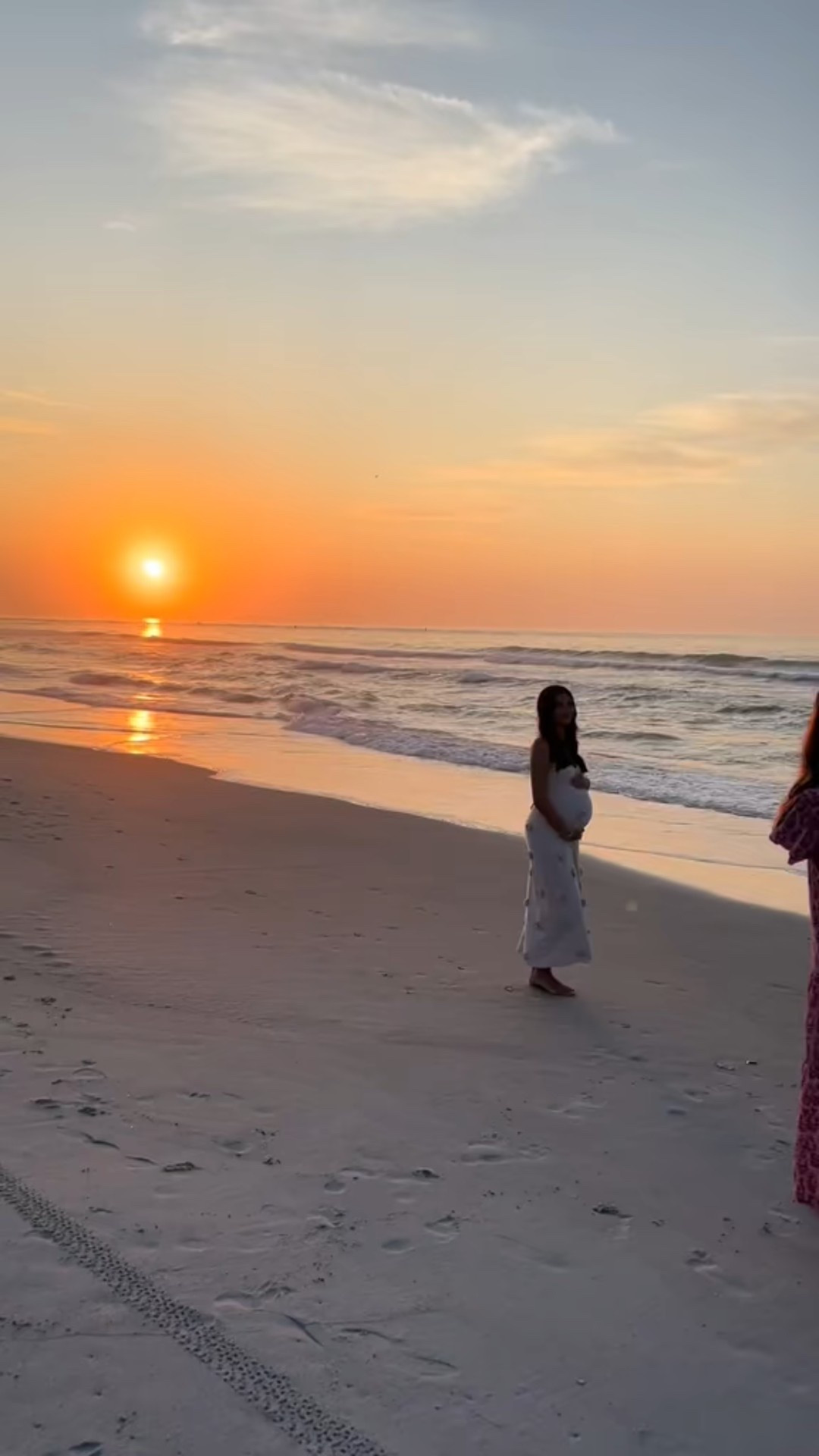 Amazon maternity photoshoot dress! I got it in the color apricot and a size small and it worked perfect for these sunrise beach photos🤩

#LTKBump