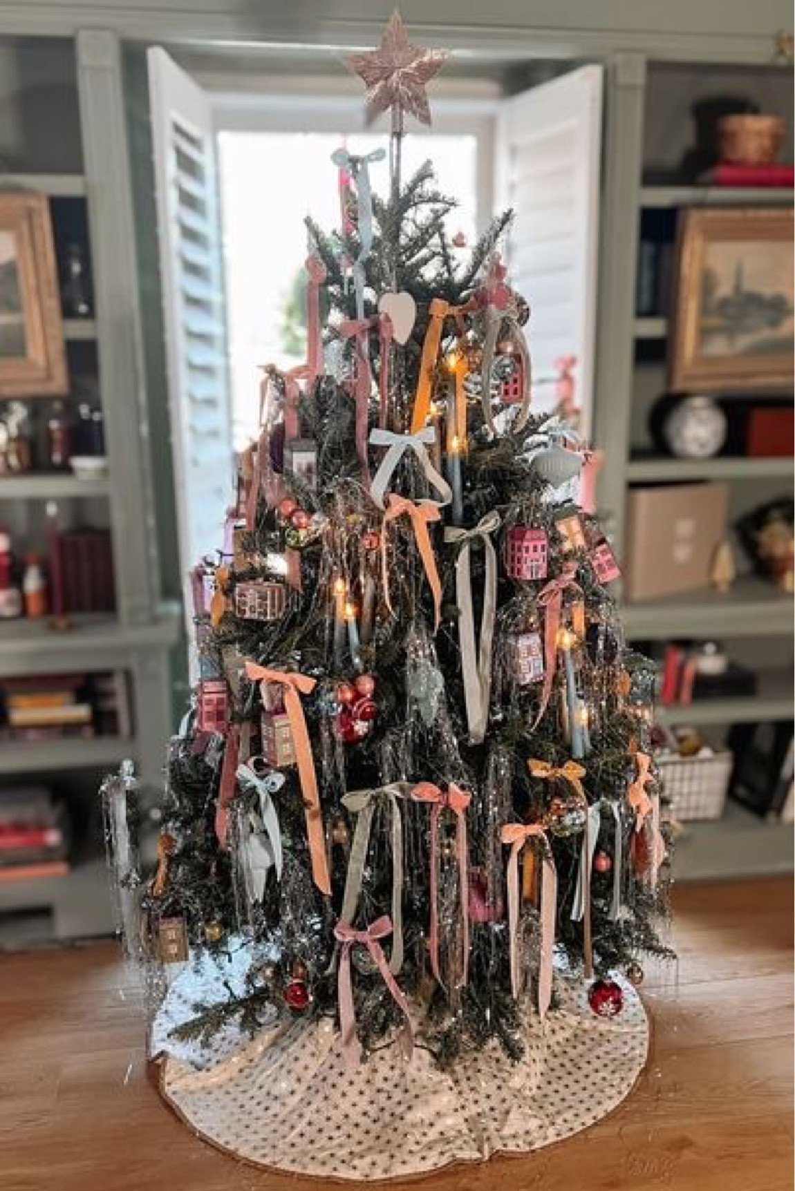 Embracing the Kitsch-mas Spirit: My library tree's a jolly jamboree of quirky ornaments, glittering nostalgia, and a dash of whimsy! 🎄✨ #KitschyChristmas #TreeJoy #QuirkyCheer

#LTKHoliday #LTKSeasonal #LTKhome