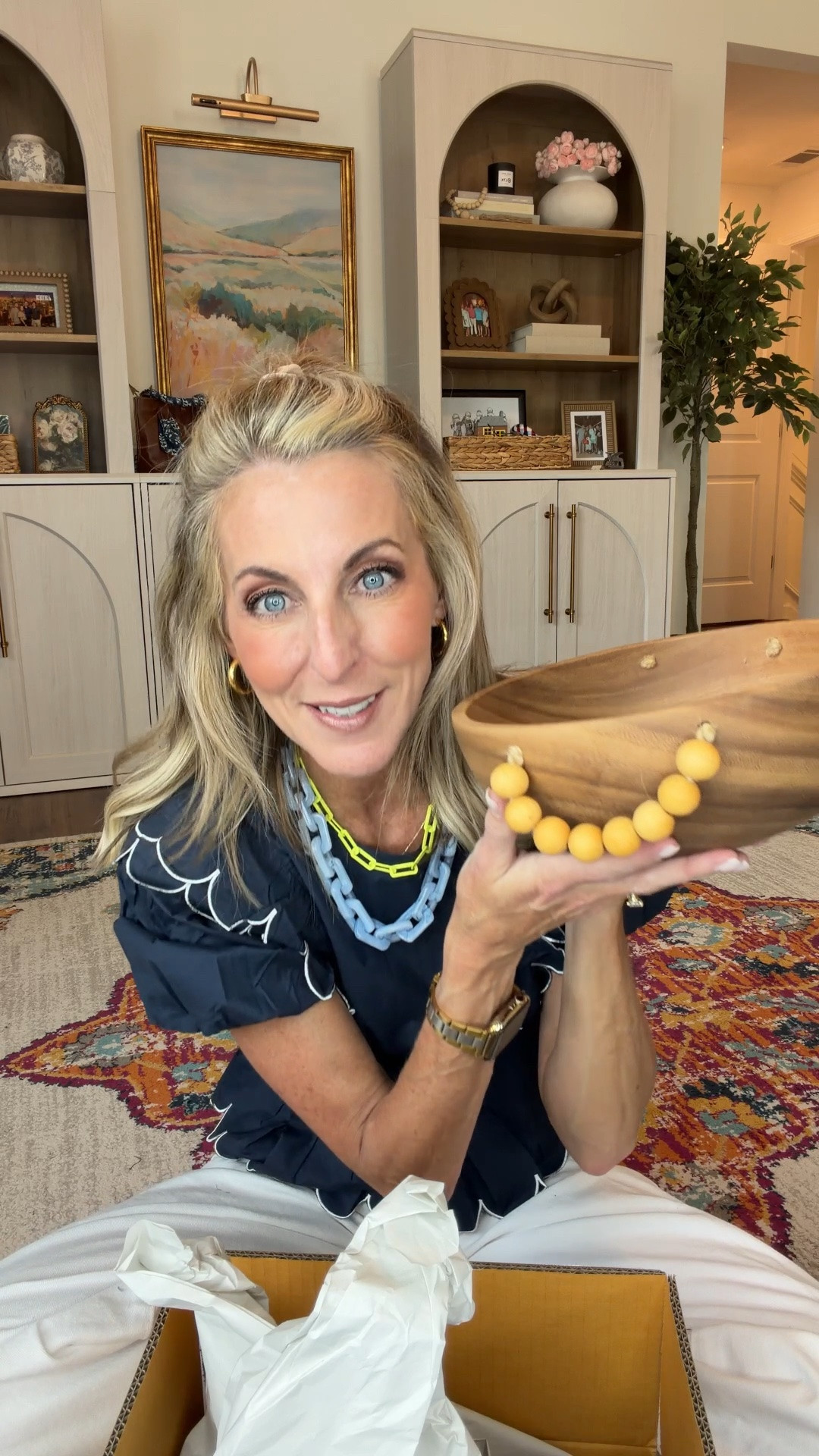This beautiful salad acacia bowl with beaded handles is gonna be perfect for by entryway table.