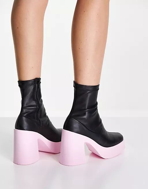 ASOS DESIGN Elsie high heeled sock boot in black with pink sole | ASOS (Global)