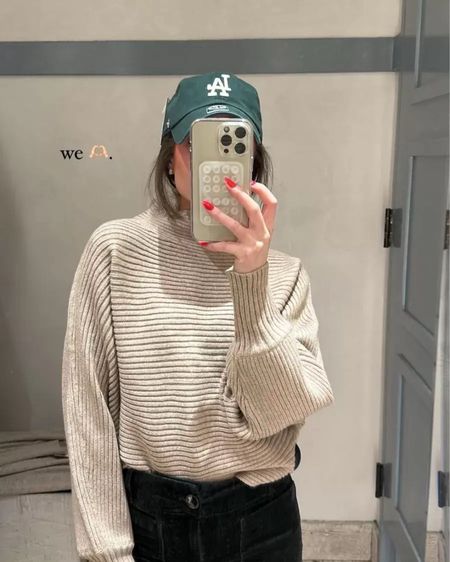 Anthropologie LA baseball cap pairs great with an oversized fit sweater and it comes in several colors! The sweater I have on is sold out but I’m linking other cute sweaters. This is the perfect combo for those cool spring evenings! 

#LTKSeasonal #LTKfindsunder100 #LTKstyletip