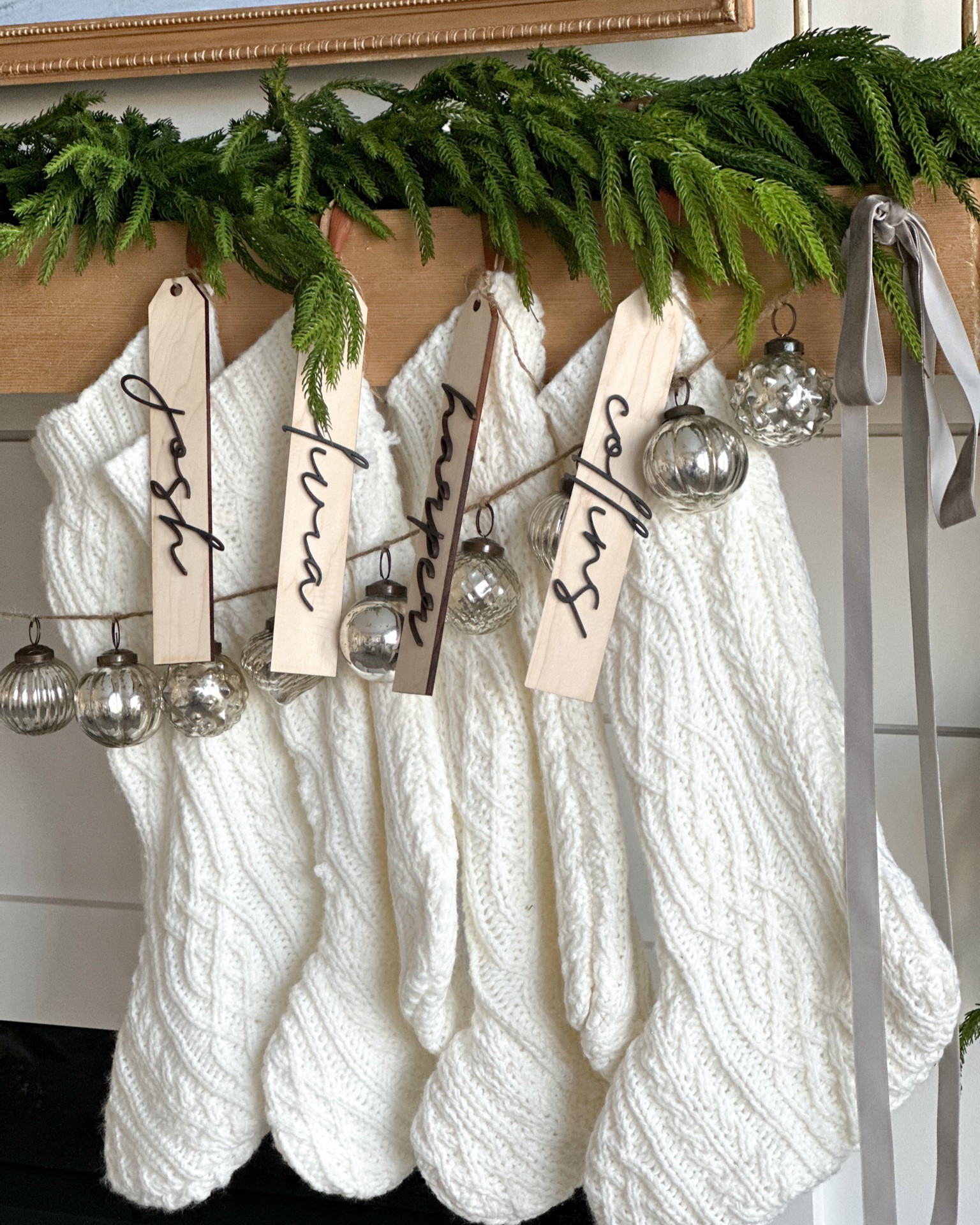 Stocking tags, holiday mantle, Christmas mantle, Christmas stockings, garland, Norfolk pine garland 

#LTKSeasonal #LTKHoliday