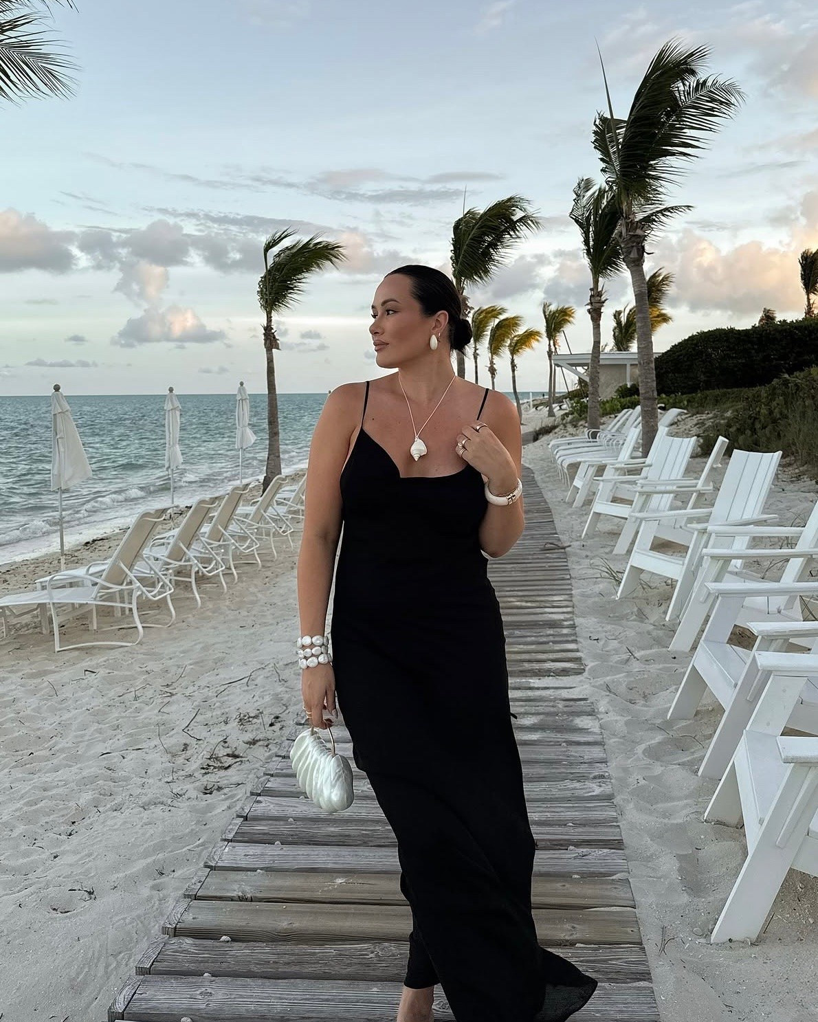 Chic black maxi dress outfit for summer vacation - obsessed with this shell necklace for vacay!

#LTKootd #LTKSeasonal