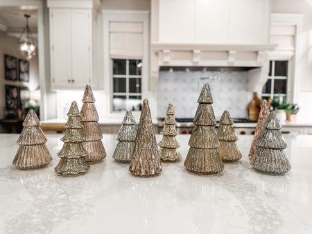 A collection of glass Christmas trees makes for an easy holiday centerpiece!🎄

#LTKSeasonal #LTKHoliday #LTKhome