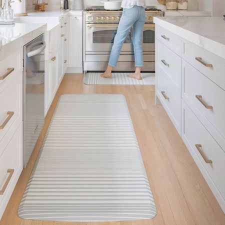Get ready to make your kitchen more stylish and ergonomic with House of Noa’s Nama Standing Mat | Coastal “Nantucket”
🏷️ $79
🐚 Yes, we all know how much I love Nantucket, MA, but is it possible to love this House of Noa anti-fatigue mat a little more? 😉 

The Color, “Nantucket,” boasts my a minimal stripe design of blue and ivory. My 2 favorite colors!  

I never thought I could get so excited about a standing mat! 

Chic & Sophisticated! Tasteful & Effortlessly Perfect! AND… the design is hand-illustrated! #swoon 

🧜🏻‍♀️ Anti-fatigue kitchen mat. Easy-care, wipe-clean. 

Choose l comfort AND style with House of Noa. 

& One More Thing Before You Go!  Use this standing mat in your office as a desk mat, in the kitchen as a kitchen mat, in the hallway as runner, or in your laundry room as a laundry room mat. 

🇺🇸 Made right here in the USA. 

📦 FREE shipping on orders over $150
+ 365 day limited warranty (https://www.thehouseofnoa.com/pages/warranty)

Love Your Home! 🫶🏠

#Nantucket #HouseOfNoa #LTKFind #Competition

#LTKunder100 #LTKhome #LTKFind