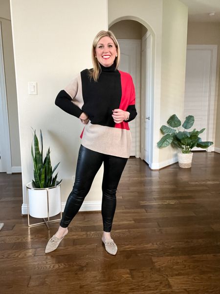 Thanksgiving Outfit Ideas: Colorblock poncho and faux leather leggings. Add chain mules.  Poncho runs true to size. Leggings run true to size. Chain mules similar linked.

#LTKunder100 #LTKstyletip #LTKHoliday