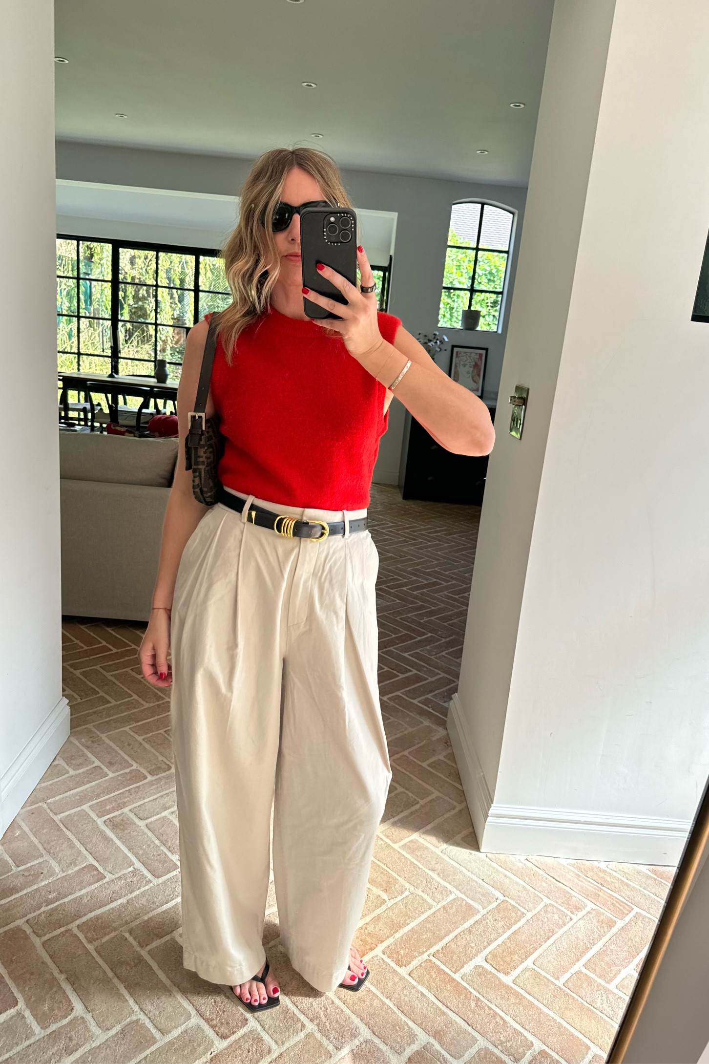 Beige Chinos + Red Knit Tank + Leather Flip-Flops | workwear | transitional outfit | September style 

#LTKuk #LTKsummer #LTKstyletip