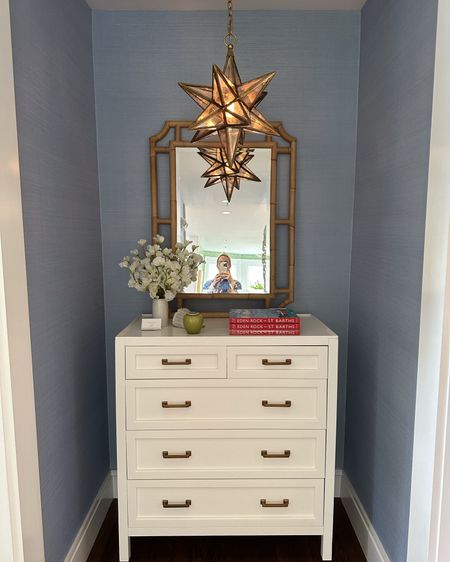 Loved this little entryway combo at Serena and Lily in Westport - star chandelier, white chest, rattan mirror, etc. 

#LTKHome