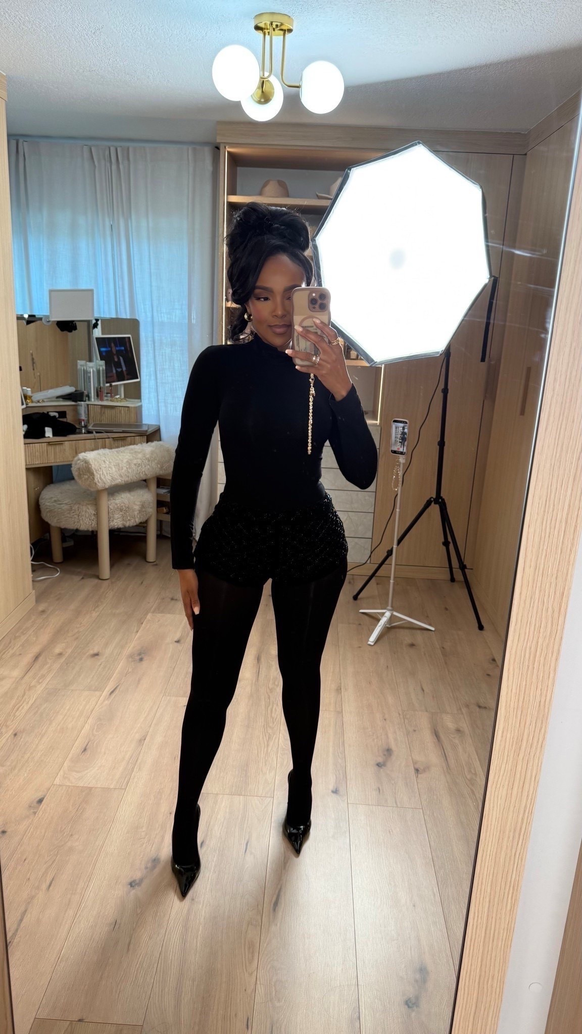 ✨ All-black, but make it elevated — a fitted mock-neck styled with embellished shorts and sheer tights for a sleek, sculpted night-out look. Minimal, modern, and confidence-forward with just the right amount of shine.

Perfect for holiday parties, cocktail nights, and dressed-up dinners when you want something chic without overdoing it.

📏 Sizing:
Top — Small • Shorts — Small • Tights — Small • Heels — TTS

📐 Measurements:
5’4” • 138 lbs • 34D • 27” waist • 40” hips

all-black outfit ideas, holiday party outfit, embellished shorts look, sheer tights styling, elevated winter night-out outfit, modern evening fashion

✨ Everything linked below for easy shopping

Follow me on Instagram and YouTube @kirasfashionfinds

#LTKPetite #LTKHoliday #LTKootd