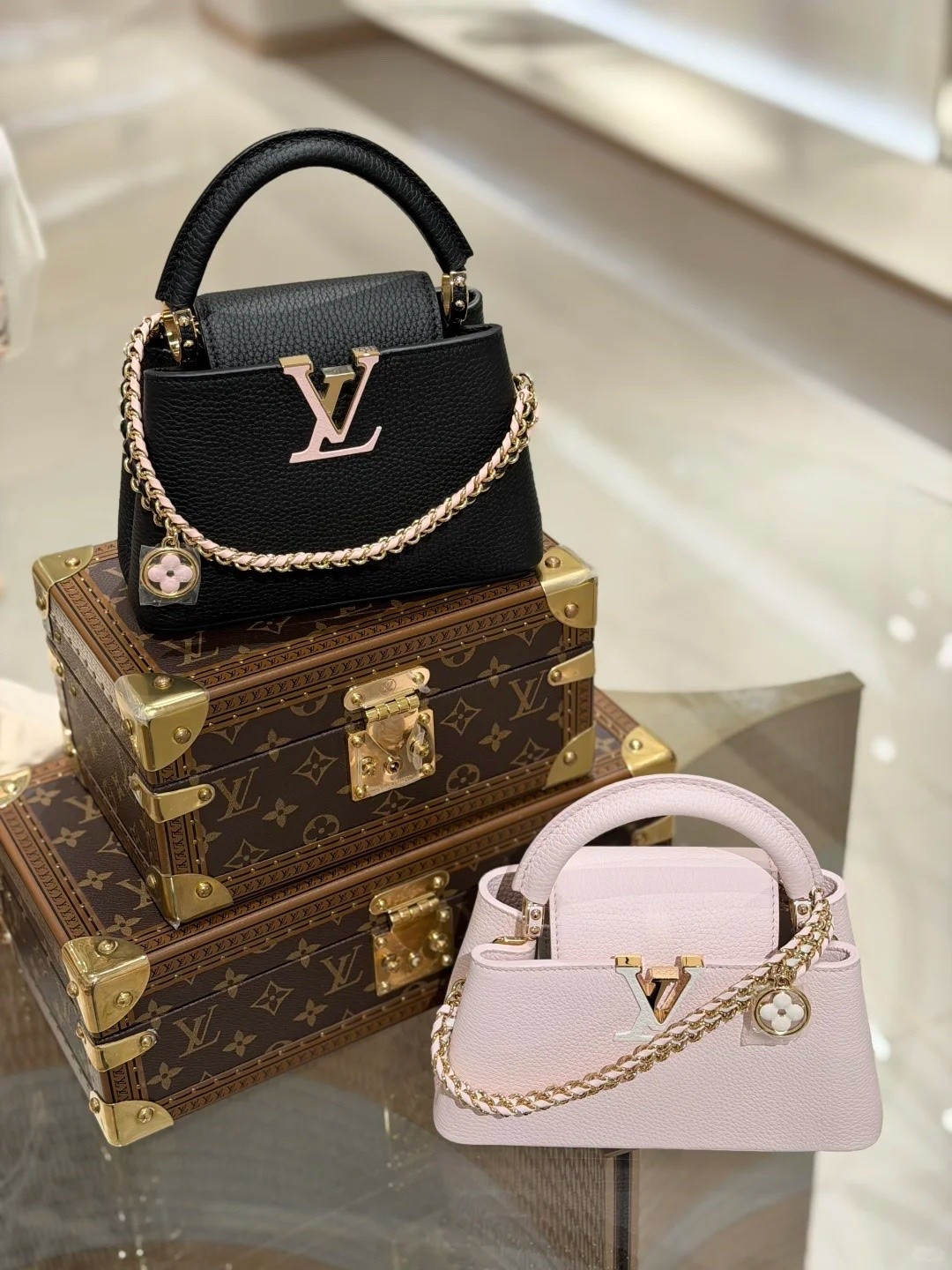 Tiny bag, major obsession 🖤🎀 These Louis Vuitton Capucines are the definition of timeless luxury with the prettiest feminine touch. The black with the blush LV detail is SO chic, and the soft pink version has my heart for spring and summer styling. Paired with the iconic LV trunks? Absolute dream display. ✨

These are the kind of investment pieces that instantly elevate every outfit — from denim and sneakers to date night looks. Classic, elegant, and forever in style. 🤍 #LouisVuitton #Capucines #LuxuryStyle #DesignerBags #HandbagObsessed #FeminineStyle #LuxuryFashion #SpringStyle #BagCollector

#LTKootd #LTKgrwm #LTKmomlife