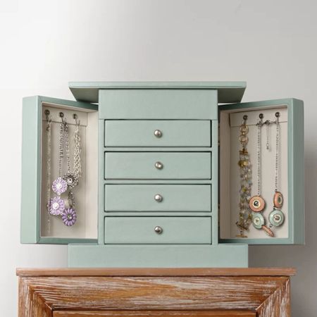 The Jewelry Box + is a game changer. This jewelry box is ON SALE and is under $80.

Keywords: Home, jewelry, jewelry box, organized 

#LTKFindsUnder100 #LTKHome #LTKSaleAlert