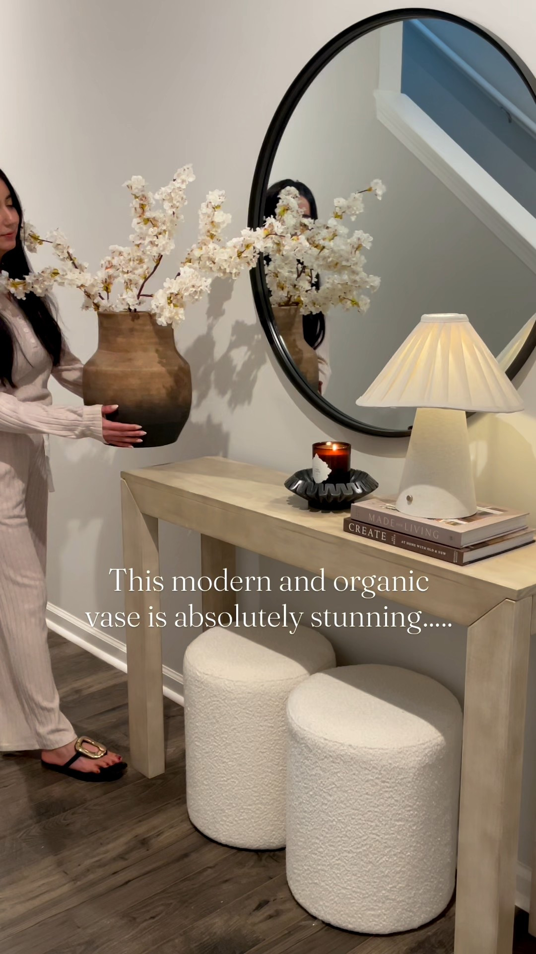 Spring 2026 console table decor

This modern and organic vase is absolutely gorgeous 

#LTKHome #LTKOver40 #LTKSeasonal