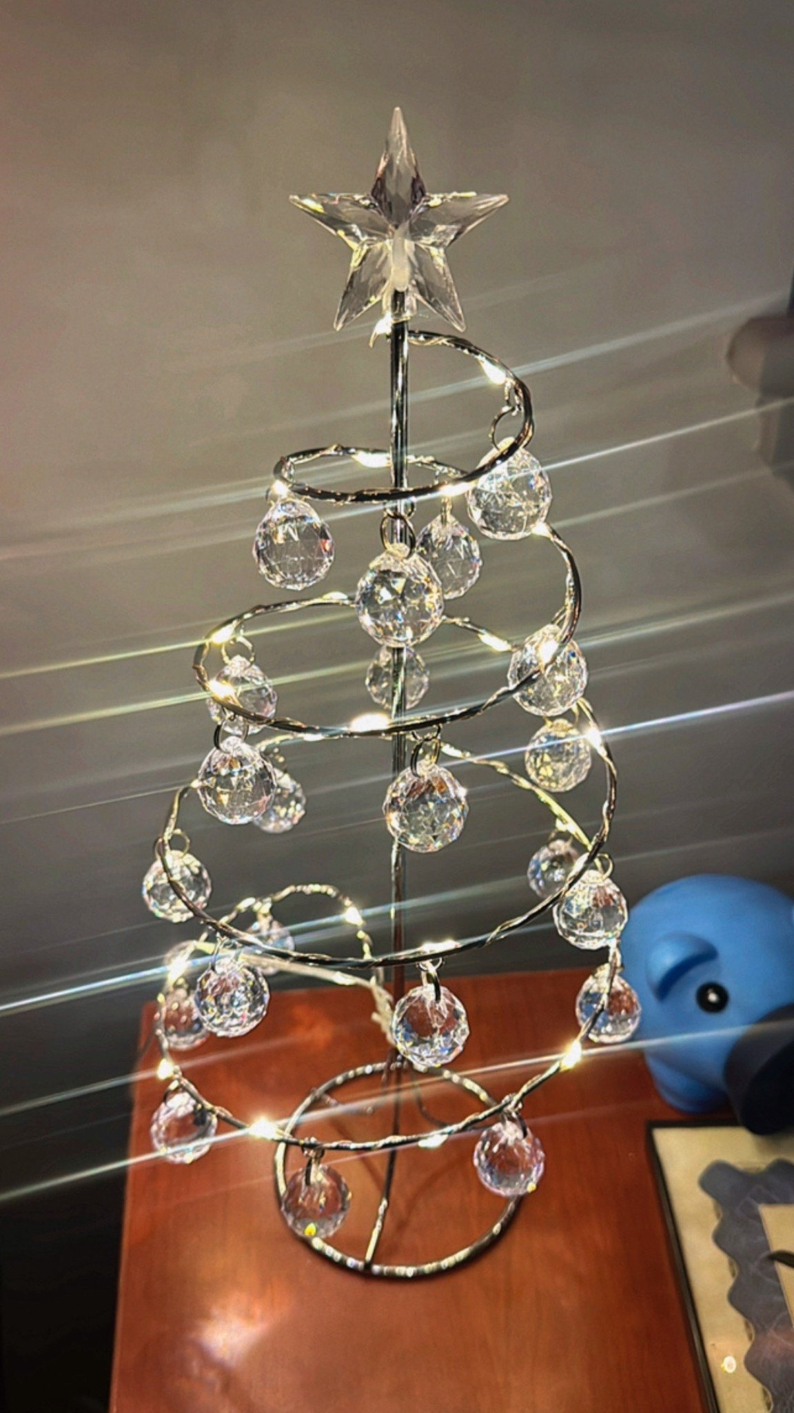 ✨ Holiday Ready Desk Decor Alert ✨
This crystal spiral mini Christmas tree is honestly the cutest thing ever for adding a little holiday sparkle to any space. The LED warm white lights, the hanging crystal ornaments, and the star topper make it look so luxe and festive without taking up a ton of room.

It’s the perfect office desk decoration, small-space Christmas décor, apartment-friendly holiday piece, or the sweetest gift idea for someone who loves glam, minimalist, or modern holiday vibes. The crystals catch the light beautifully and give that soft glow that instantly makes your space feel cozier.

Use it on your desk, entryway table, bookshelf, nightstand, vanity, or coffee bar for the cutest pop of holiday cheer. ✨🎄
Holiday décor, Christmas home accents, cozy winter vibes, small Christmas tree, glam holiday décor, crystal tree, LED Christmas tree, modern holiday decorating, festive office setup—this checks every box.

#LTKHoliday #LTKGiftGuide #LTKFindsUnder50