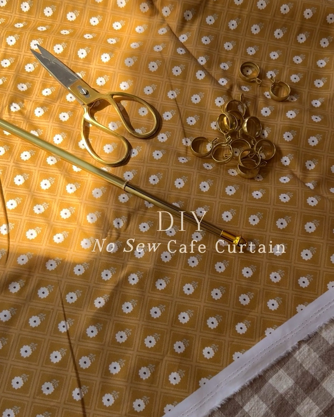 Is there anything sweeter than a café curtain? Even better, this no-sew version just took 10 minutes to create! It instantly added so much charm (and needed privacy) in our sunny yellow pantry! Plus, a little peek at a new fabric print I designed, available soon! 🌼

I’ve got all the step-by-step details above, and links to the super adorable gold curtain rod, rings, and hem tape will be  linked below! 

#LTKHome #LTKVideo