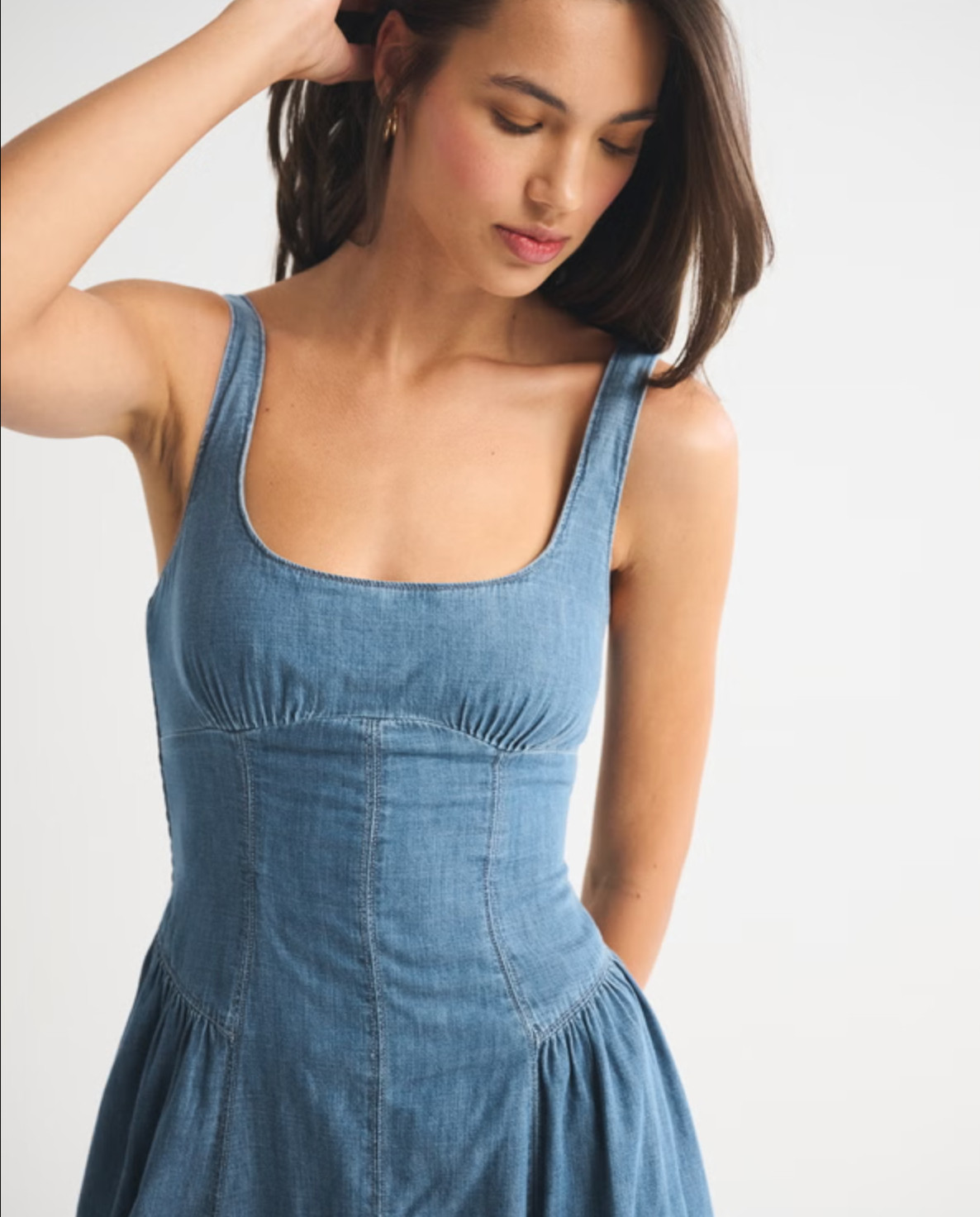 Effortless and flattering 🤍 The Abercrombie A&F Bra-Free Dylan Midi Dress is part of their bra-free collection, designed with built-in support (removable pads!) so you can skip the bra. It features a scoop neckline with delicate picot trim, adjustable straps, back smocking, and a dipped waist that flows into the prettiest skirt. The classic poplin fabric makes it perfect for everyday wear, brunch, or dressing up with heels ✨ 

 #LTKSpringSale #LTKootd #LTKSaleAlert