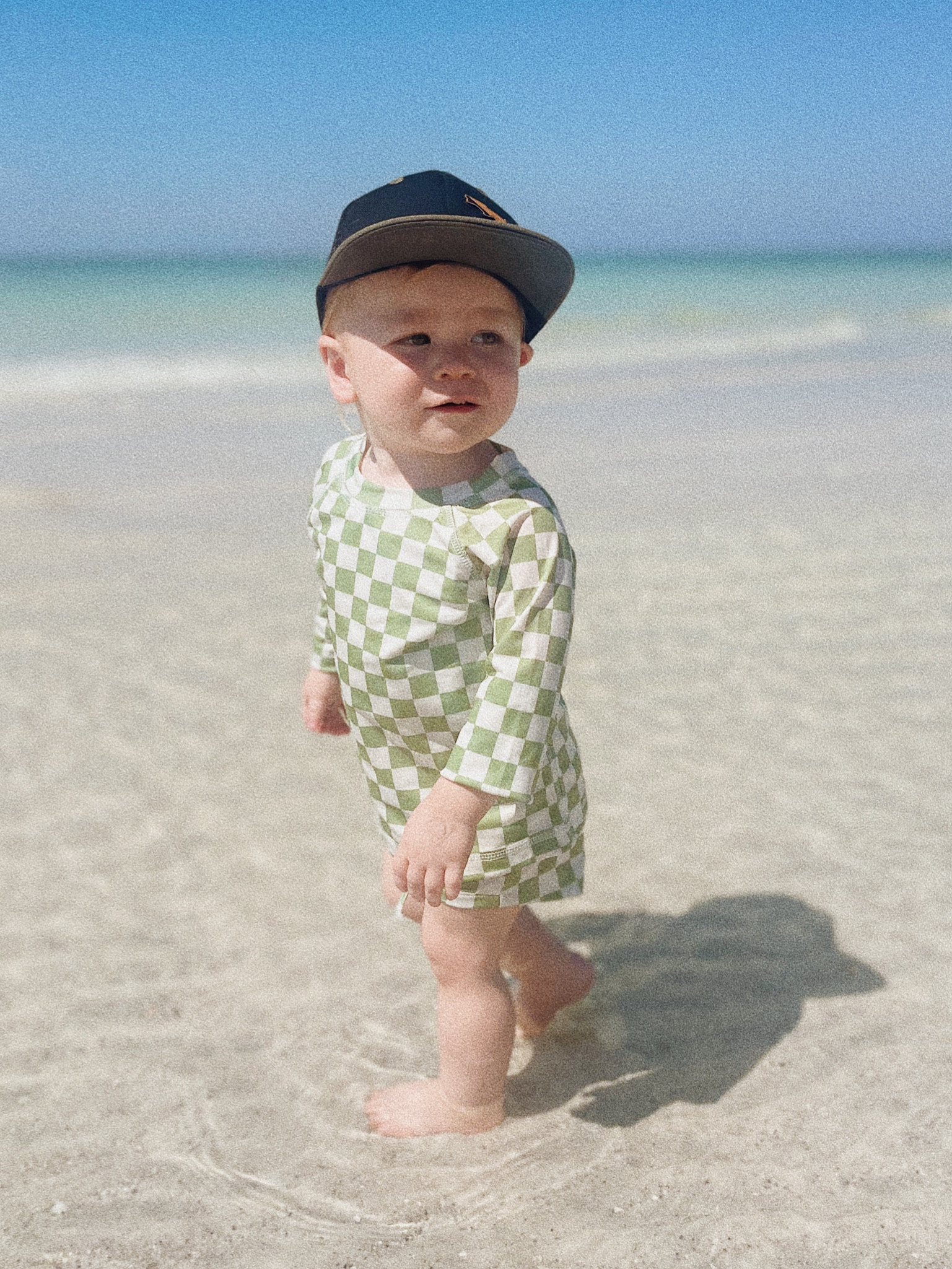 Checkerboard print swim suit 

#LTKSeasonal #LTKswim #LTKbaby
