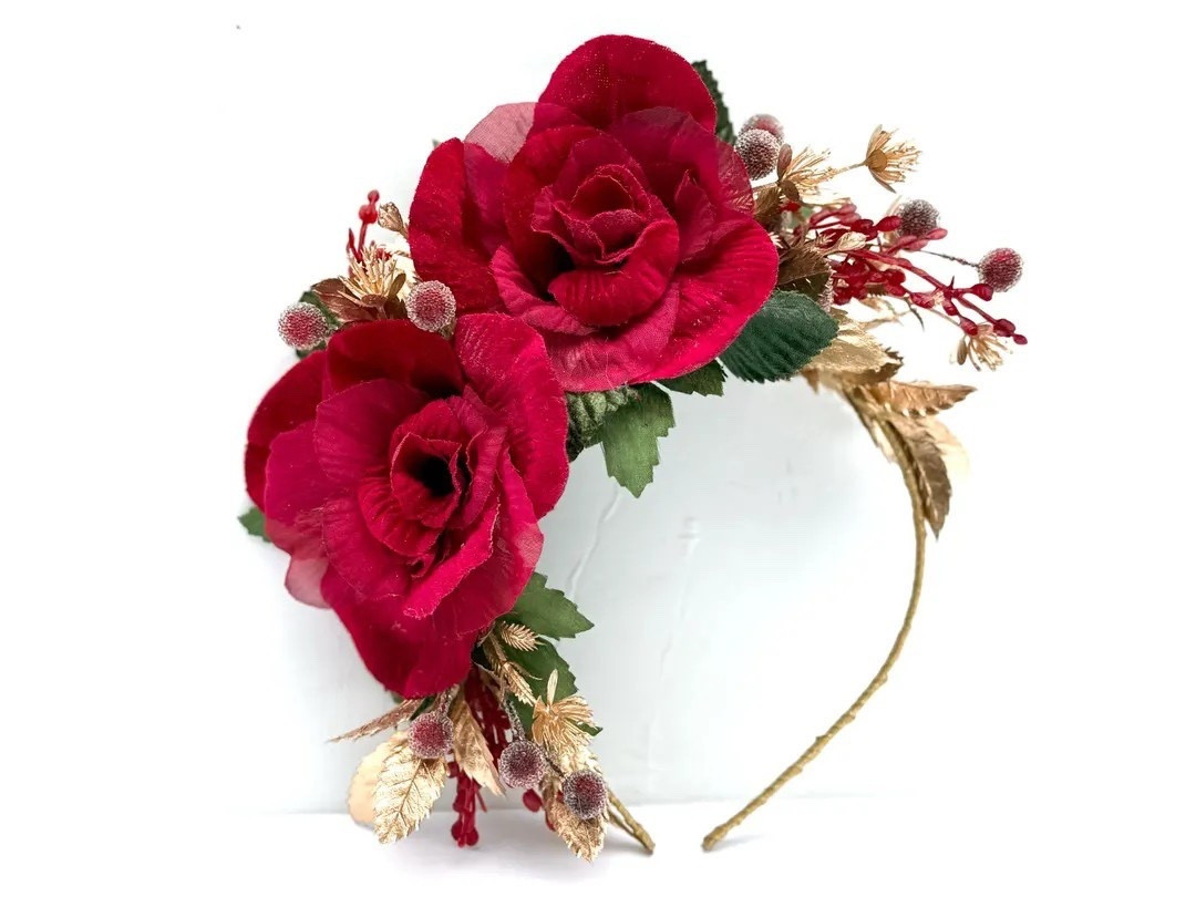 Elevate your holiday style with this romantic red velvet flower headpiece, handcrafted from vintage velvet roses and chiffon petals for an ethereal, feminine look. Accented with red glass berries, berry sprigs, metallic gold leaves, and lush velvet and fabric foliage, each detail is carefully arranged on a gold ribbon-wrapped headband with an eco-felt lining for comfort and heirloom quality. Perfect for festive gatherings, photoshoots, or making a statement at any special occasion, this headpiece blends timeless elegance with holiday cheer.

#LTKstyle #LTKholiday #FestiveAccessories #HandmadeHeadpiece #VelvetFlowers #EtsyFinds #HolidayStyle #StatementAccessory #SeasonalFashion

#LTKHoliday #LTKSeasonal #LTKFindsUnder100