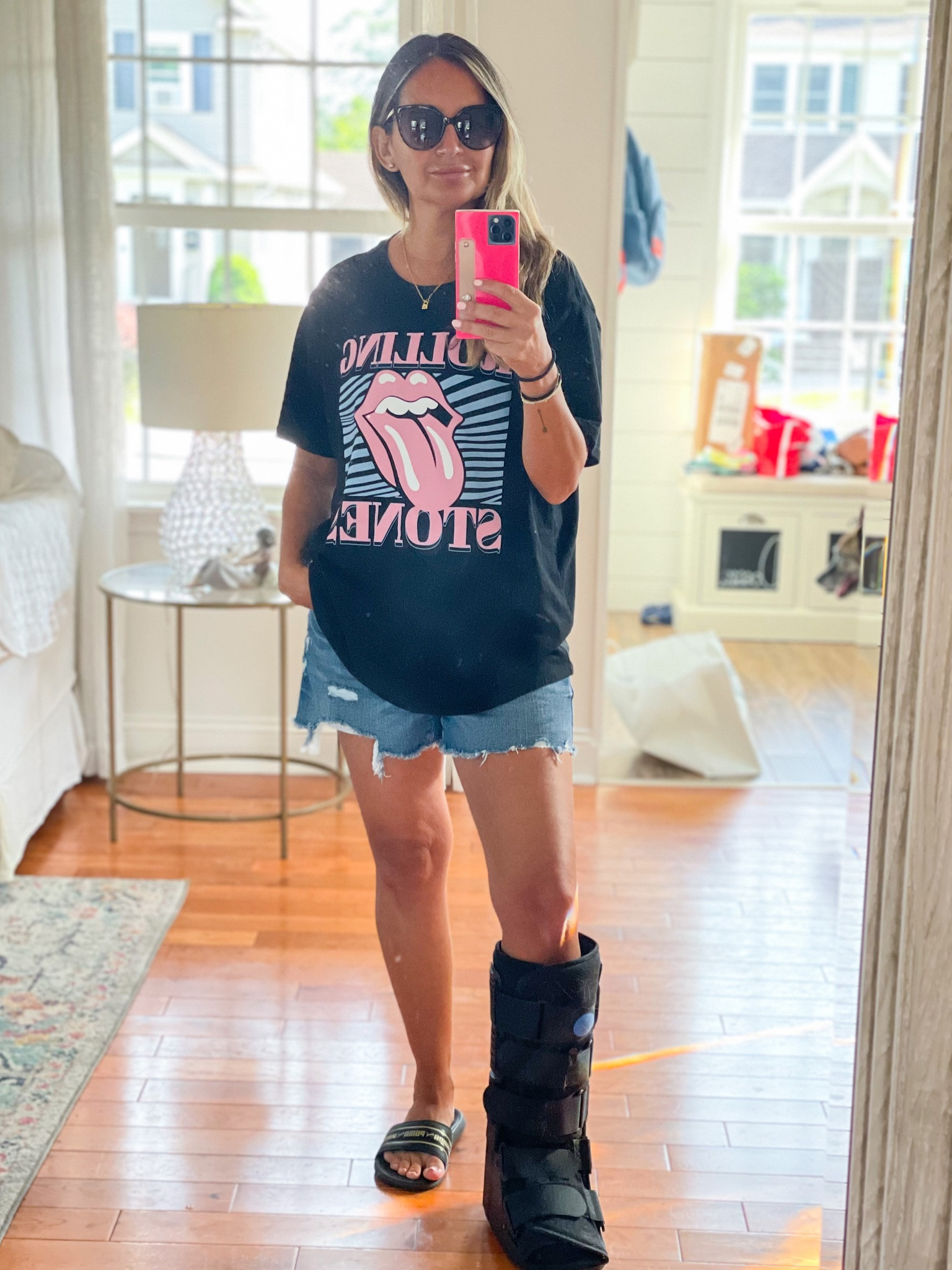 Trying to feel cool in my sad looking boot lol. 

Can’t go wrong with a good band tee  that’s under $10!

#LTKsalealert #LTKstyletip #LTKSale