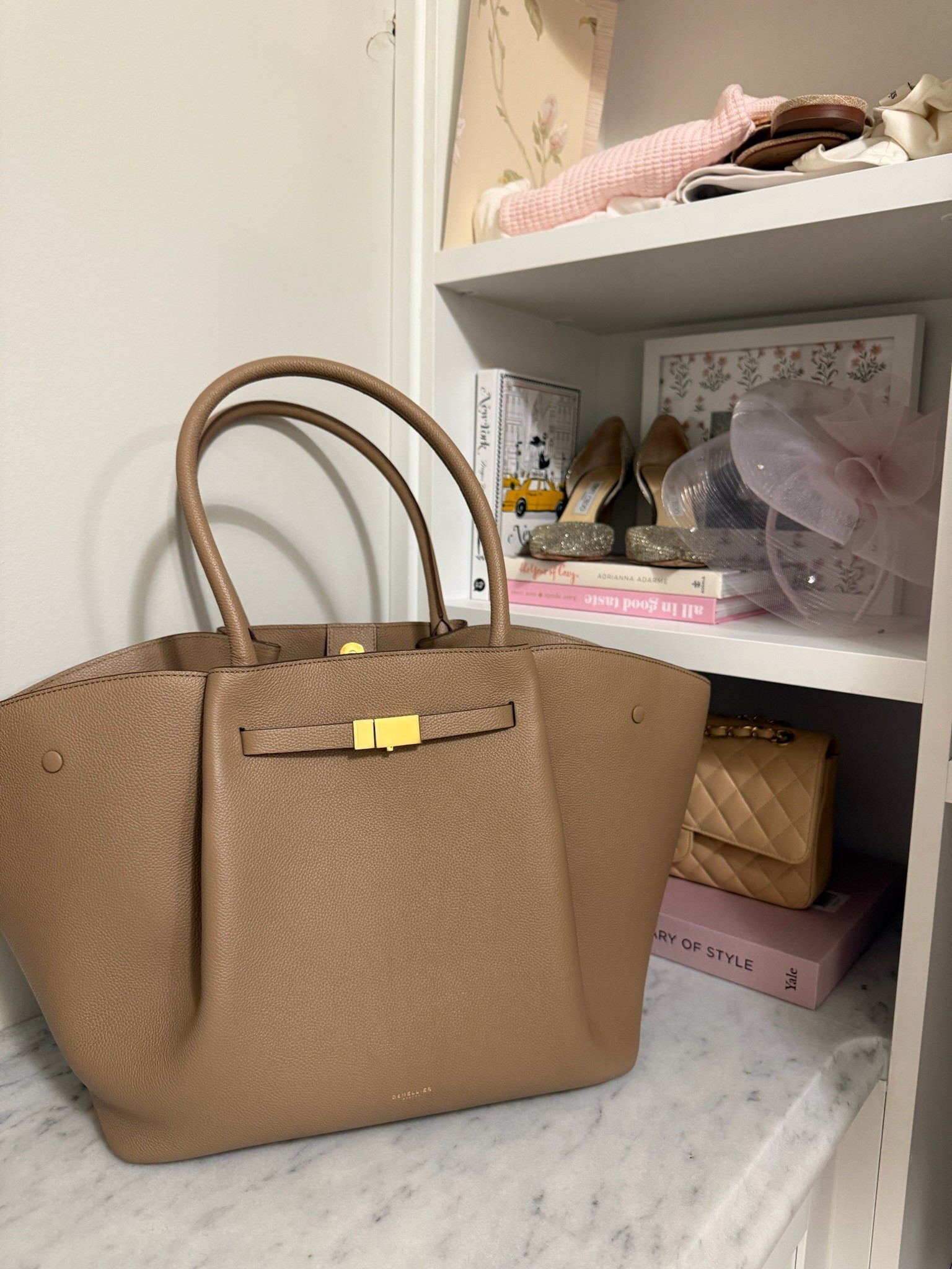 My go to tote this season! Love the color and quality. It’s big enough to fit all the mom necessities, but not too bulky. I’ll also link a look for less. Summer bags // tote bags // work bags // handbags 

#LTKItBag #LTKSeasonal