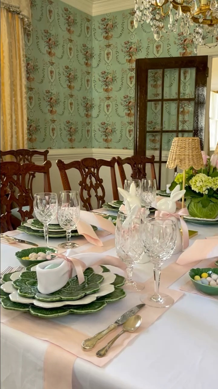 How to Fold an Easter Bunny Ear Napkin. 🐰 It's a simple yet delightful way to add a touch of whimsy to your Easter or Spring table setting.🌷

Materials Needed:
* Square Starched Napkin - 20” x 20”
* Ribbon

Step by Step Instructions:
1. ﻿﻿﻿Fold napkin into a triangle. Fold triangle about 1/2 way down and continue folding to the narrowest point.
2. ﻿﻿﻿Turn up into the shape of bunny ears.
3. ﻿﻿﻿Place an Easter egg in the middle part of the napkin.
4. ﻿﻿﻿Tie ribbon into a bow just above the egg to hold the egg in place. I’ve found that if I tie a bow backwards, it will be straight. 

Whether you're hosting a festive brunch or just want to bring a smile to your family's faces, this charming detail is sure to do the trick. I'd be thrilled to see how you make this idea your own. Be sure to tag me in your creations! What are your plans tomorrow? Sending you all lots of love and inspiration this Easter weekend.
Blessing, Rachel 🫶🏻✝️🌷🥬🐇🐣💐🥕
.
.
.
#springtablescape #napkintutorial #napkinfoldideas #dressyourtable #mackenziechildseveryday #napkinfoldtutorial #victoriamag #tablescapestyle #springtable #tablescapetuesday #settingthetable #napkinfolds #seasonalhome #diningroomdetails #thenewsouthern #southernlivingmagazine #tablesforsoiree #thecollectedlook #entertainandcelebrate #traditionalinterior #tabledecorations #festivedecor #easterinspiration #dressingthetable #southernladymag #entertainingideas #traditionalhomedecor #playwithyourdishes #betterhomeandgardens #diningroominspiration

#LTKhome #LTKstyletip #LTKSeasonal