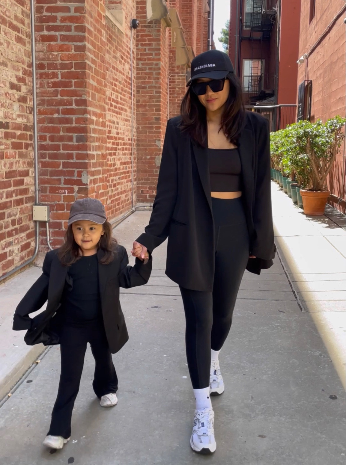 Matching airport outfits: all black with white sneakers 

#LTKkids #LTKfamily #LTKstyletip