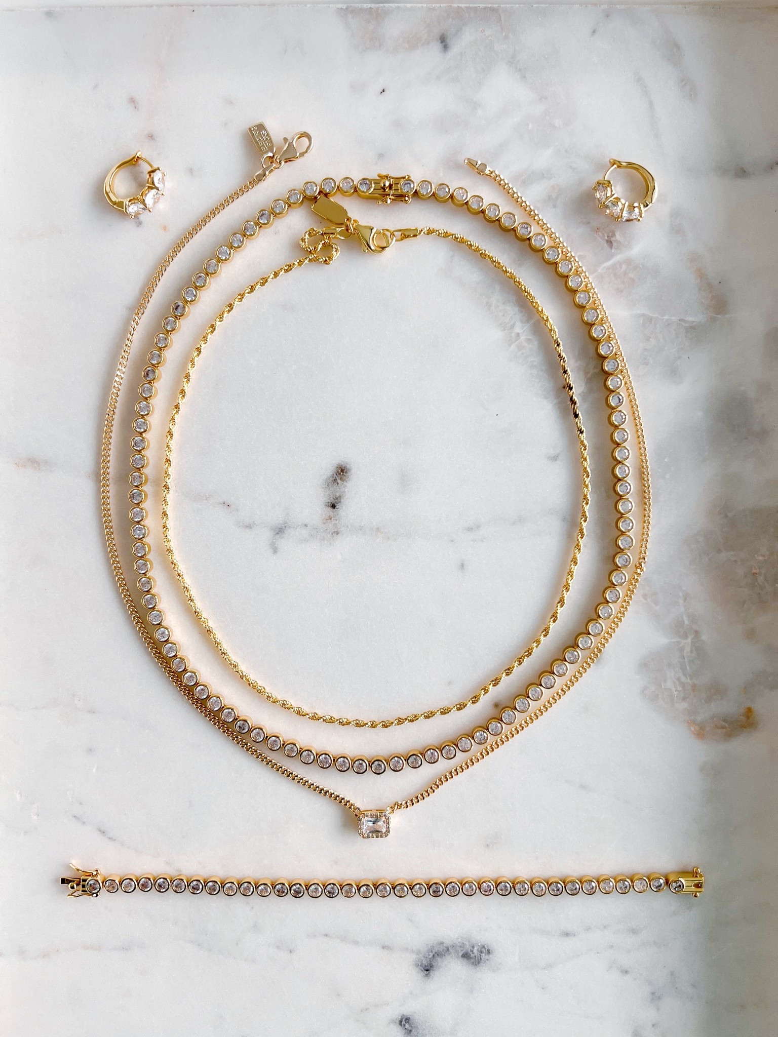 Love this jewelry collection from Electric Picks! It sold out quickly last year but it’s back again this season! Such classic, timeless styles that can be worn for years to come! The trademark necklace is one of my favorite pieces from the collection and you can mix this piece with any other necklaces you may have to create your own stack. There’s also a classic twist necklace, beautiful eternity necklace and bracelet and cute huggie earrings.

All of these items make great gifts for the holidays. Every piece is under $100 and you can mix and match or gift the entire collection. This set would also be a wonderful treat for yourself too!

Gifts for her, gifts for mom, gifts for wife, gifts for daughter, gifts for sister, gifts for mother in law, gifts for friend, gifts under $100

#LTKOver40 #LTKGiftGuide #LTKFindsUnder100