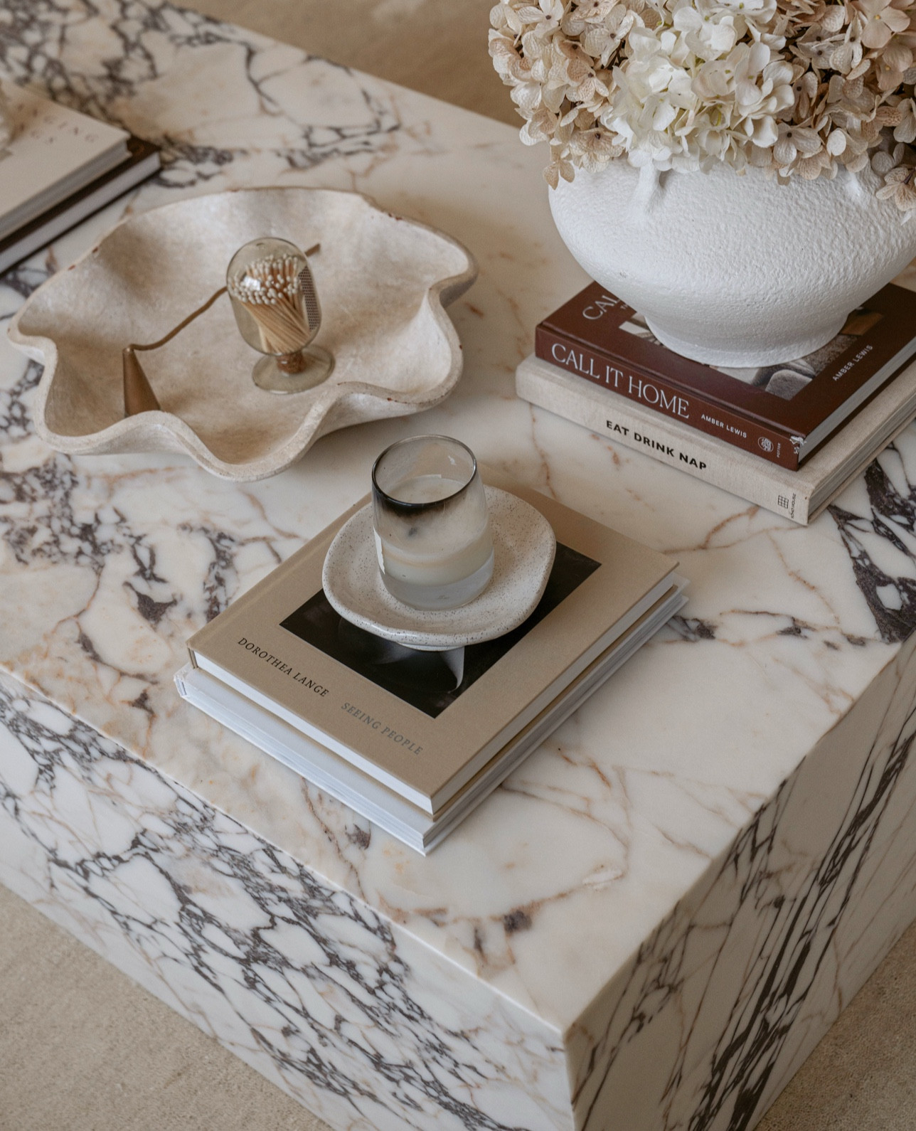 There’s something about this marble that made everything feel complete 🤍 @manhattan.home.design

I went with the 56” Calacatta Viola version of the Copenhagen Plinth Block Coffee Table, and the second it arrived… I knew she was the one. From the sculptural silhouette to the dramatic veining, it’s the kind of piece that anchors a room effortlessly.

Swipe to see every angle—I’m obsessed.
 Comment “MARBLE” for a direct link, or shop it now on my @shop.ltk page (🔗 in bio) . . . #ad #collectedhome #interiorinspo #marblestyle #liketkit #ManhattanHomeDesign #interiordesign #livingroomdetails #livingroomstyling #livingroomgoals #marblecoffeetable #cozyhomevibes #beautifulhomeinspo #modernhomedecor