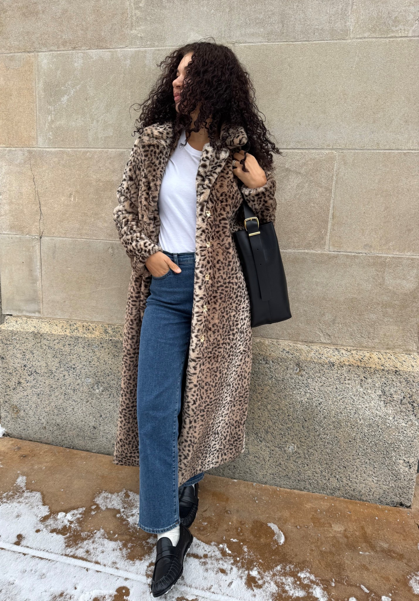 leopard print faux fur coat winter outfit with jeans, socks, penny loafers, a white t-shirt, and a bucket bag 

#LTKootd