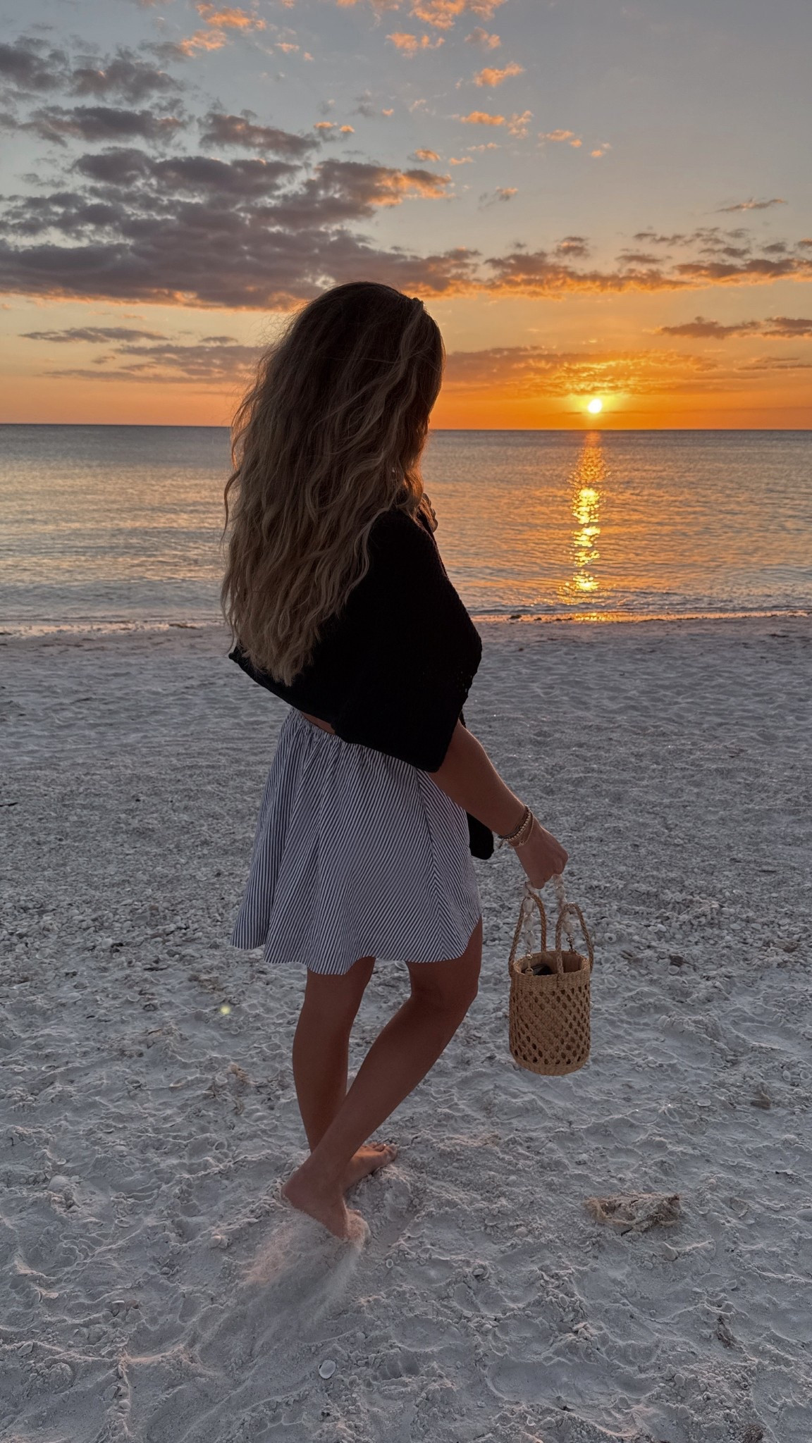 Sunset beach dinner OOTD - wearing aritzia cotton poplin dress with cotton @frankandeileen  sweater. Love this little bag with the shell strap! 🐚

#LTKSeasonal #LTKTravel #LTKootd