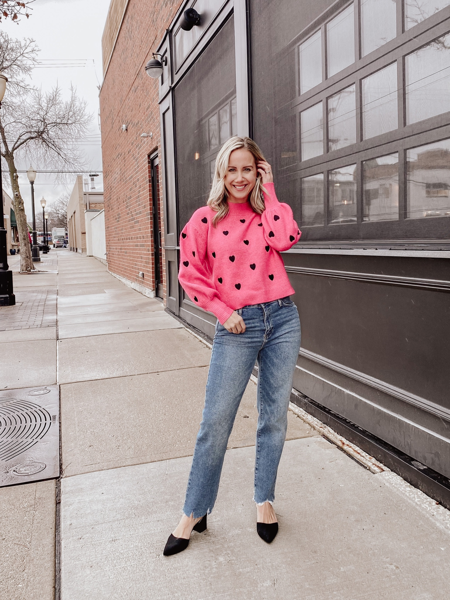 Valentines Day Outfit
pink hearts sweater | straight leg jeans | womens outfit | date night | girls night | heels 

#LTKSeasonal #LTKsalealert #LTKshoecrush