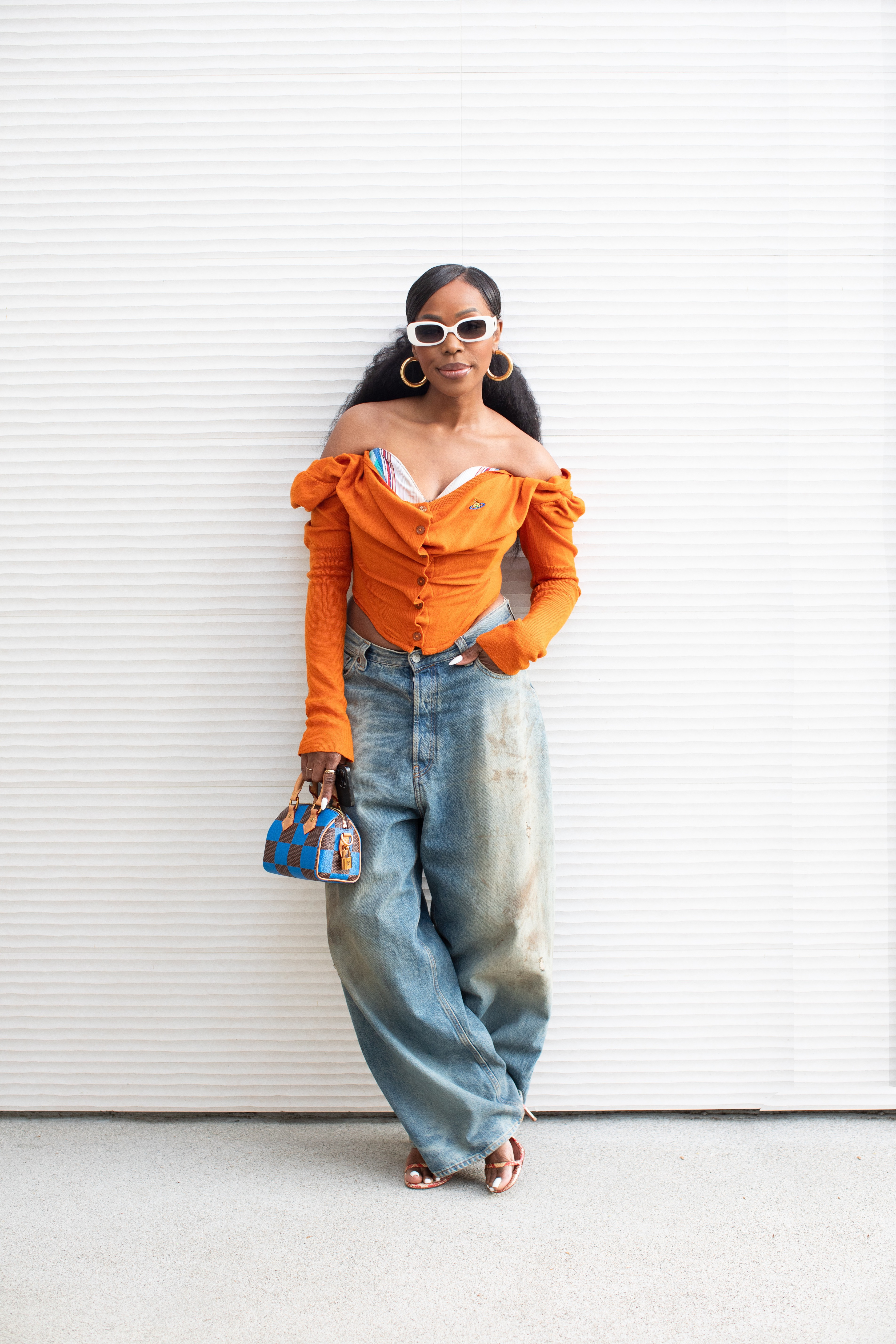 This top is sold out in this color but I linked the same style in purple and black. Also linked an affordable option for my jeans 

 #LTKStyleTip