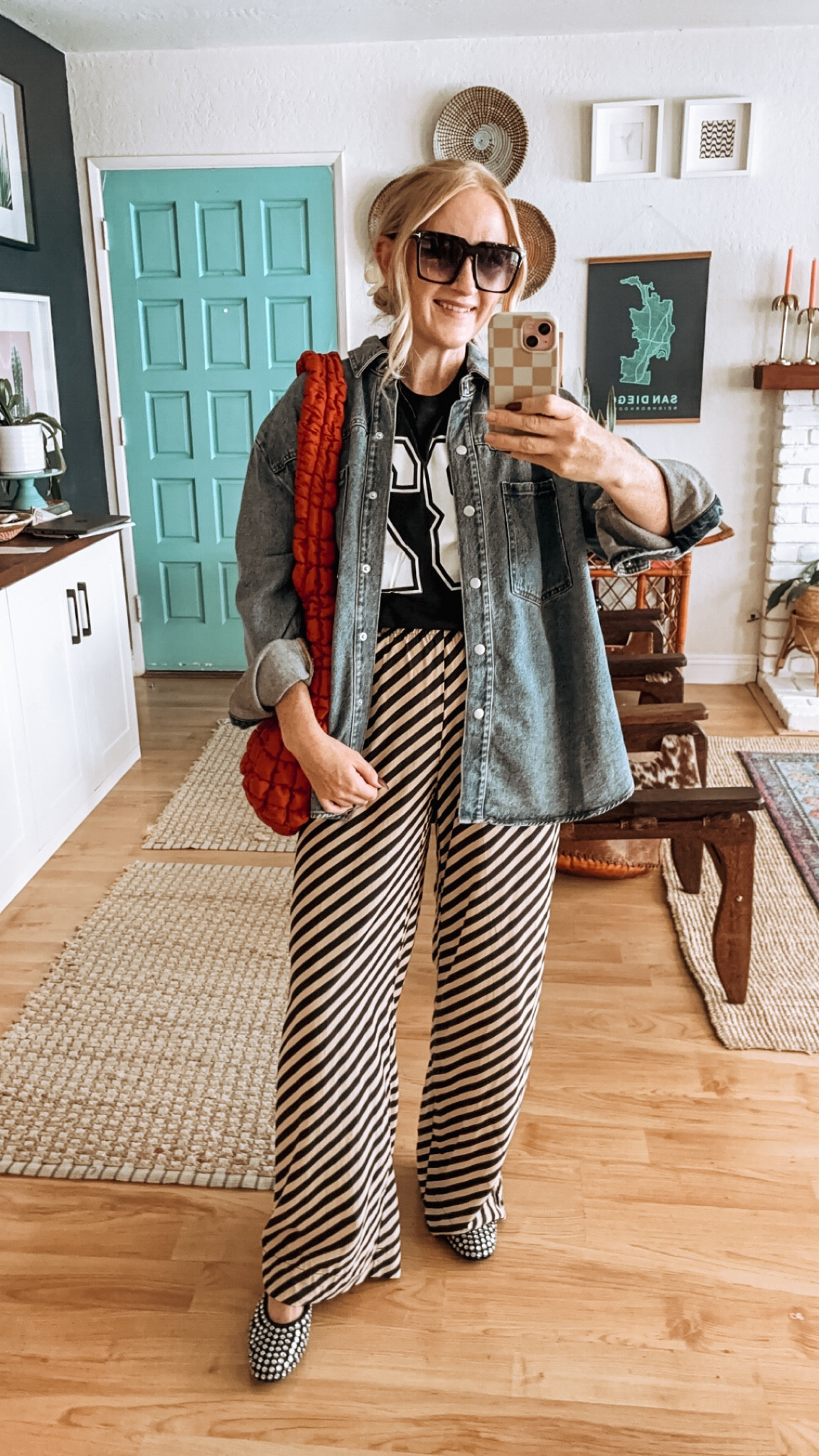 Target Haul look 2 ✨ This tee is from the girls section 😂 but I love it so much!! And this denim overcoat literally goes with all the things 👏🏻

Wearing XXL girl’s sizing in top. Size down for pants, wearing M. Size down in denim 1-2 sizes, I’m wearing M and prob could’ve done a S! 150 lbs and 5’7” ✨

SALE ALERT 🚨 20% off on women’s clothes rn at Target if you’re a Circle member 🎯Including most items in this Reel! 

SIZING INFO below: 
✨ Wearing size L unless said otherwise below
✨Denim overcoat, wearing M, runs quite big, could’ve done a S. 
✨ Flannel shirt, wearing M, runs big
✨Black 82 tee, it’s a girls tee so I’m wearing an XXL.
✨Striped pant: size down, wearing M
✨ 150 lbs and 5’7” for reference

Target haul, Target fall haul, Target style, Target finds. Target sale, Target favorites, Target tops, Target bottoms, Target outfits, fall style, fall fashion inspo, fall outfits, elevated casual, leopard print, graphic tee, denim shirt, future collective, studded flats, Mary Jane’s, target shoes 

#LTKStyleTip #LTKFindsUnder50 #LTKSaleAlert
