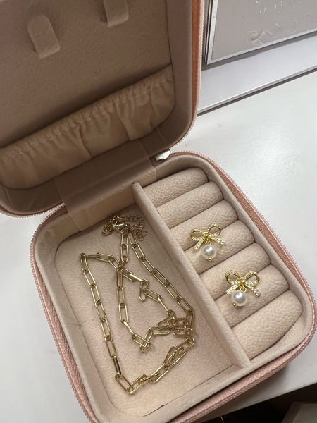 Gorgeous diamond bow pearl earrings, found at Loft on major sale. Aldo loving this thin gold paperclip chain necklace. Xoxo, Lauren #LTKbeauty

#LTKunder100 #LTKsalealert #LTKunder50