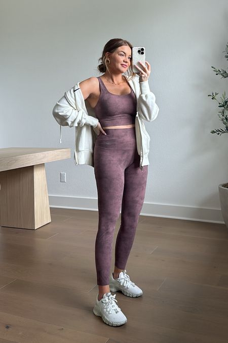 i ordered these @nikewellcollective items during pregnancy & i’m still feeling great in them postpartum! the material is so soft & stretchy. i’m wearing a small in the sports bra, a medium in the leggings & a xs in the jacket. #teamnike #ad