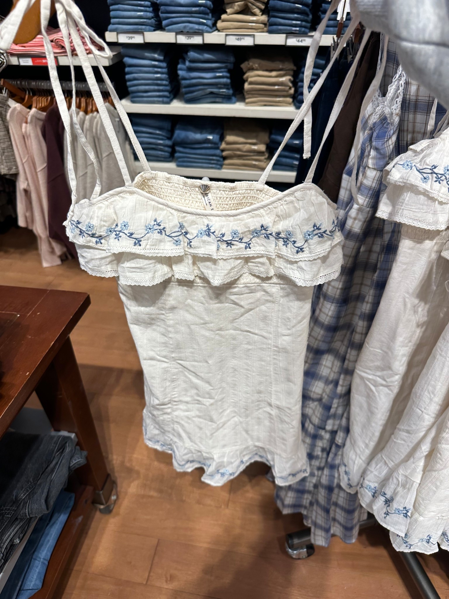 How cute is this white ruffle mini dress with blue flowers?! So cute for spring! On sale for $41! Ranges from sizes XXS-XXL!

#LTKMidsize #LTKPetite #LTKSaleAlert