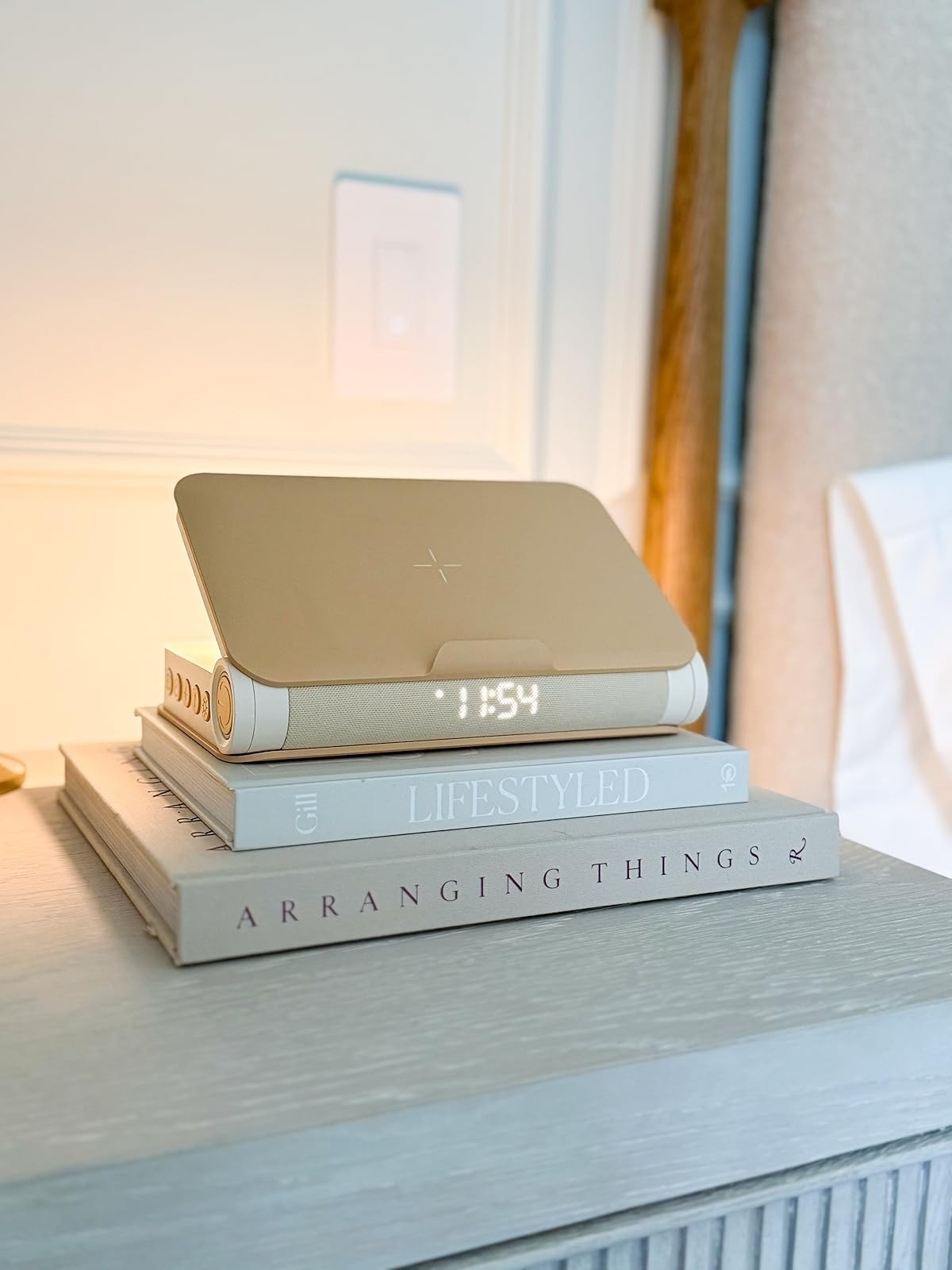 Aesthetically pleasing wireless charging station, alarm clock, bluetooth speaker, and gradual sunrise style light - all in one. 

 #LTKHome #LTKFindsUnder50
